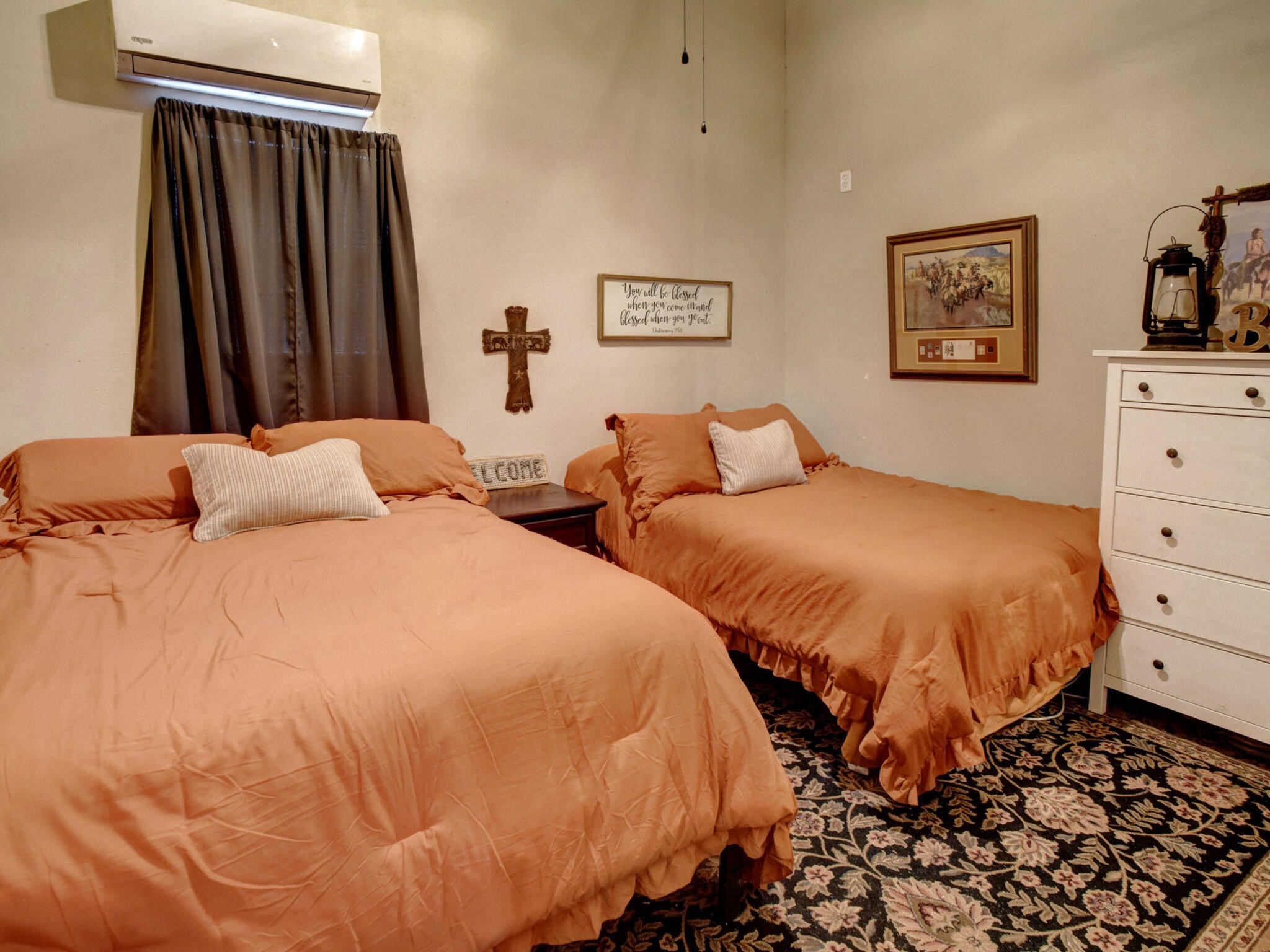 3747 Sparta Field Road Flatonia, TX 78941 - Photo 28 of 37 a bedroom with two beds and painting on the wall