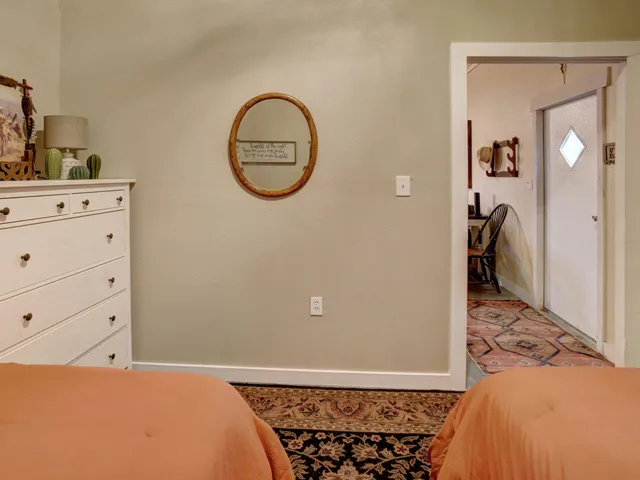a view of swimming pool with outdoor seating and plants