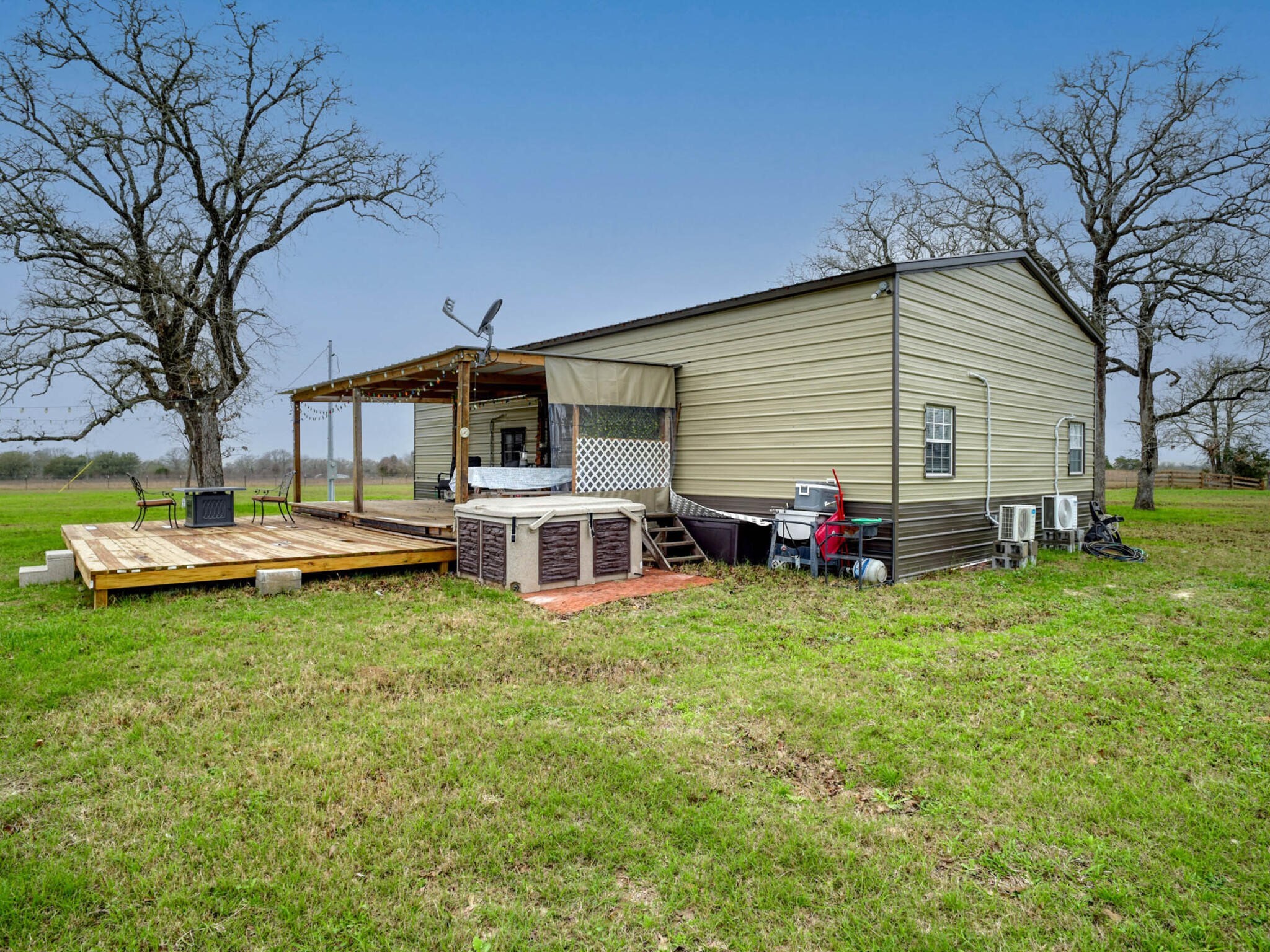 3747 Sparta Field Road Flatonia, TX 78941 - Photo 34 of 37 a view of a house with backyard and sitting area