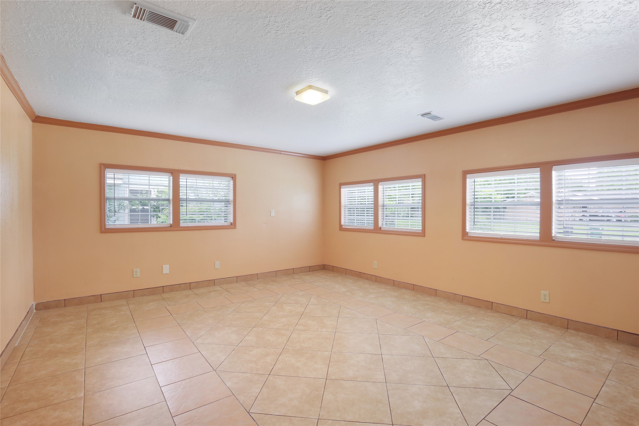 6923 Leader Street Houston, TX 77074 - Photo 15 of 19 a view of an empty room with a window