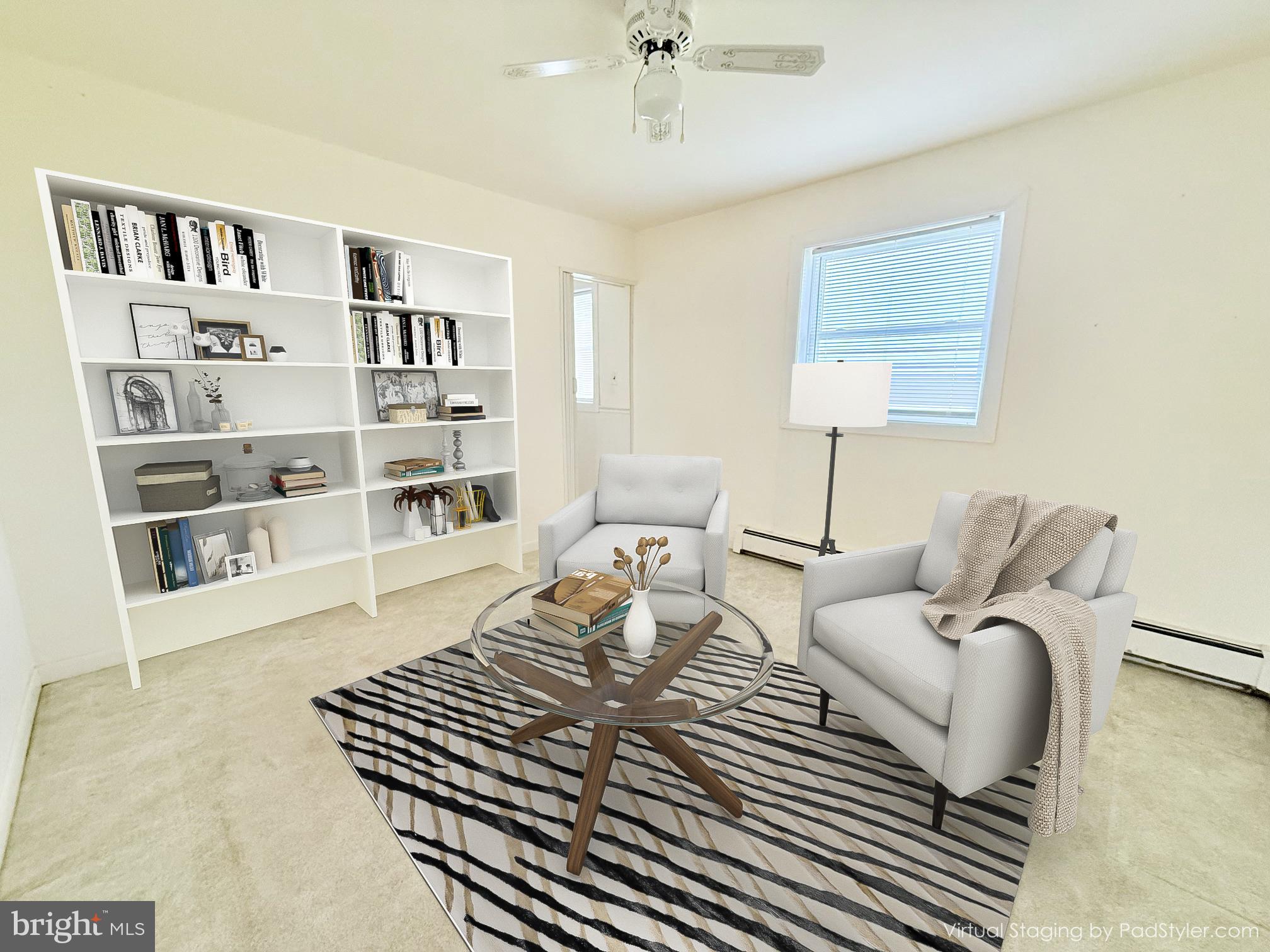 48724 Curleys Road Ridge, MD 20680 - Photo 15 of 47 a living room with furniture