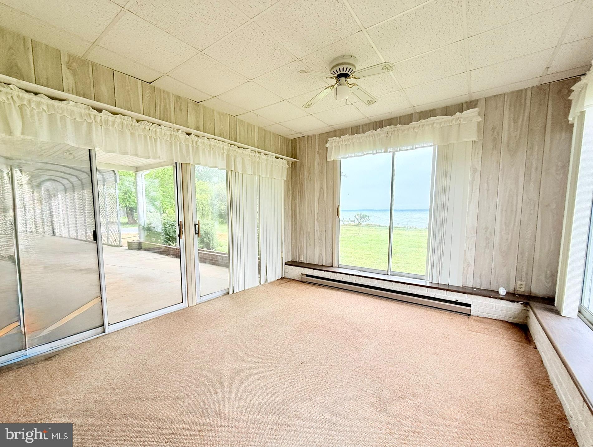 48724 Curleys Road Ridge, MD 20680 - Photo 29 of 47 a view of a room with large windows