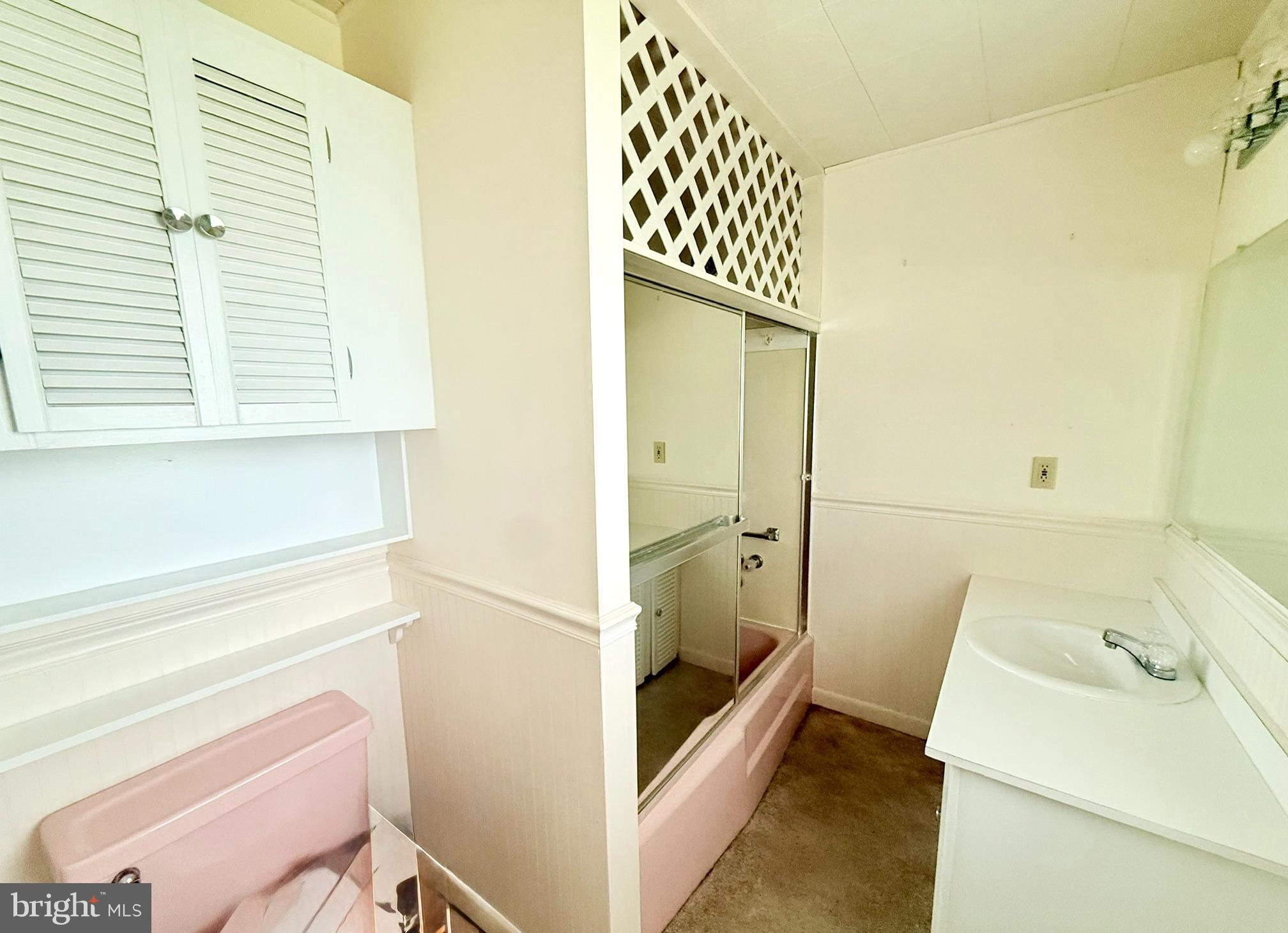 48724 Curleys Road Ridge, MD 20680 - Photo 36 of 47 a bathroom with a sink and a bathtub