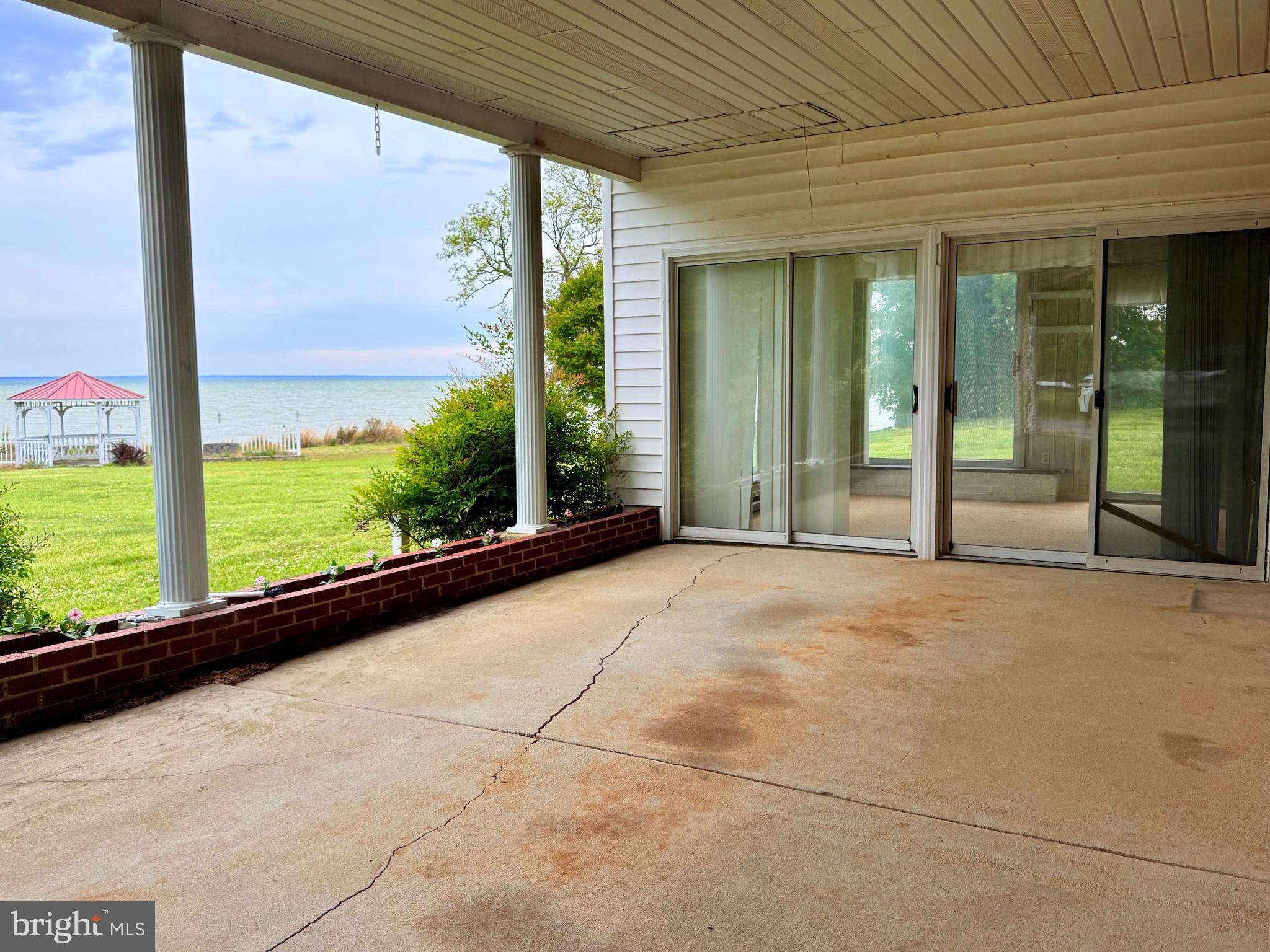 48724 Curleys Road Ridge, MD 20680 - Photo 43 of 47 a view of an empty room with a large window