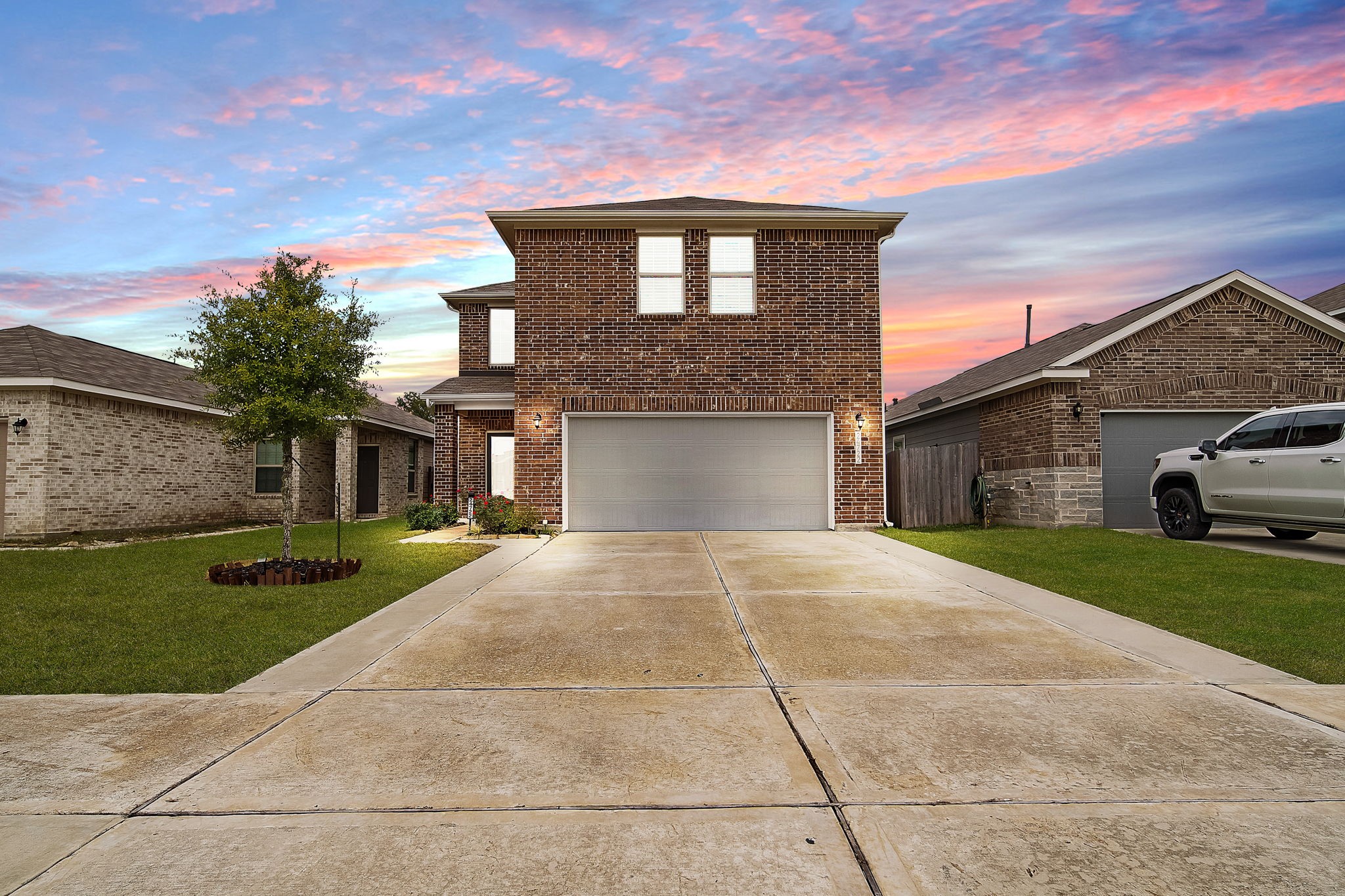 24722 Colony Meadow Trail Houston, TX 77336 - Photo 1 of 16 a front view of a house with a yard and garage