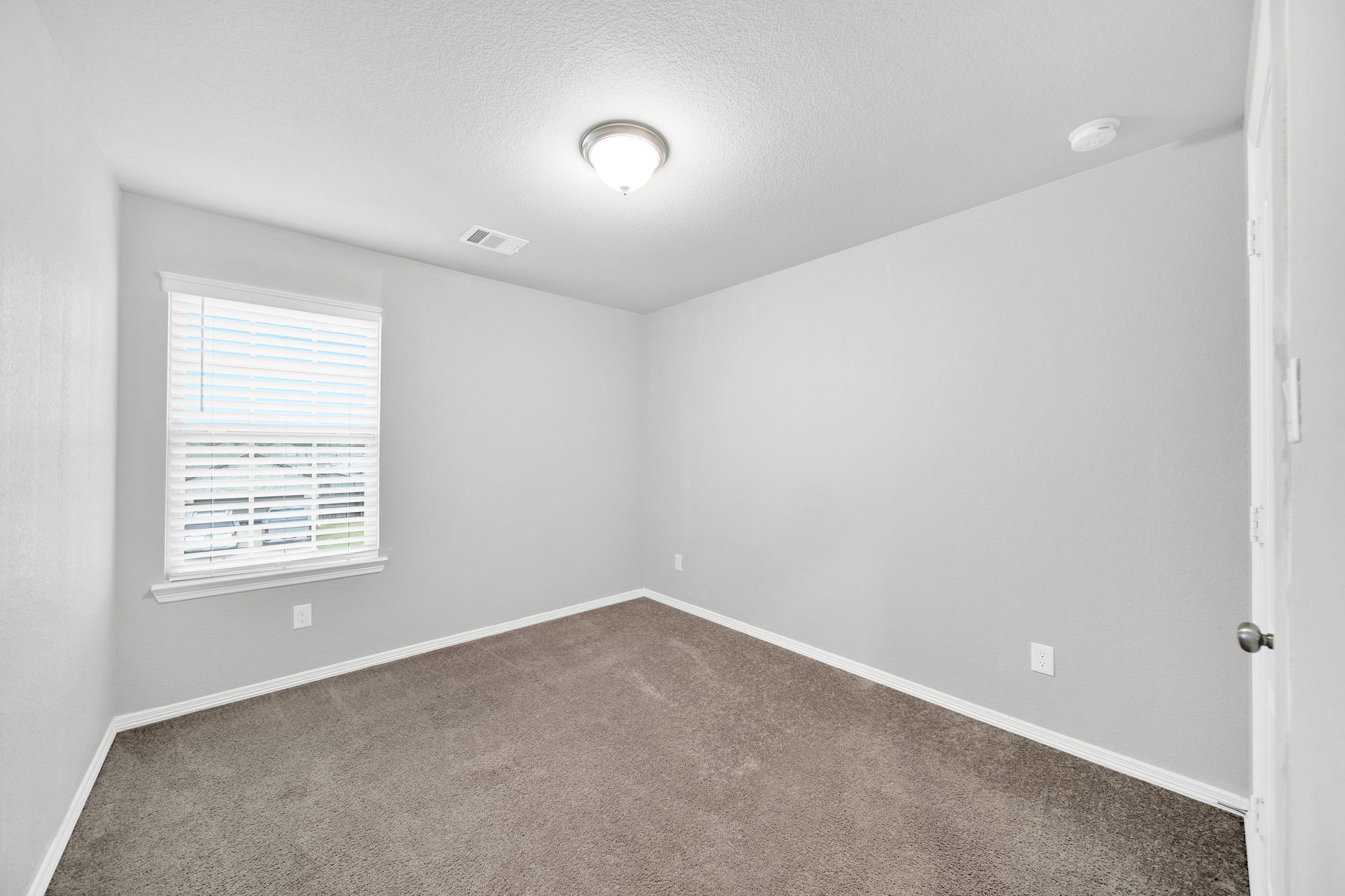 24722 Colony Meadow Trail Houston, TX 77336 - Photo 13 of 16 an empty room with a window
