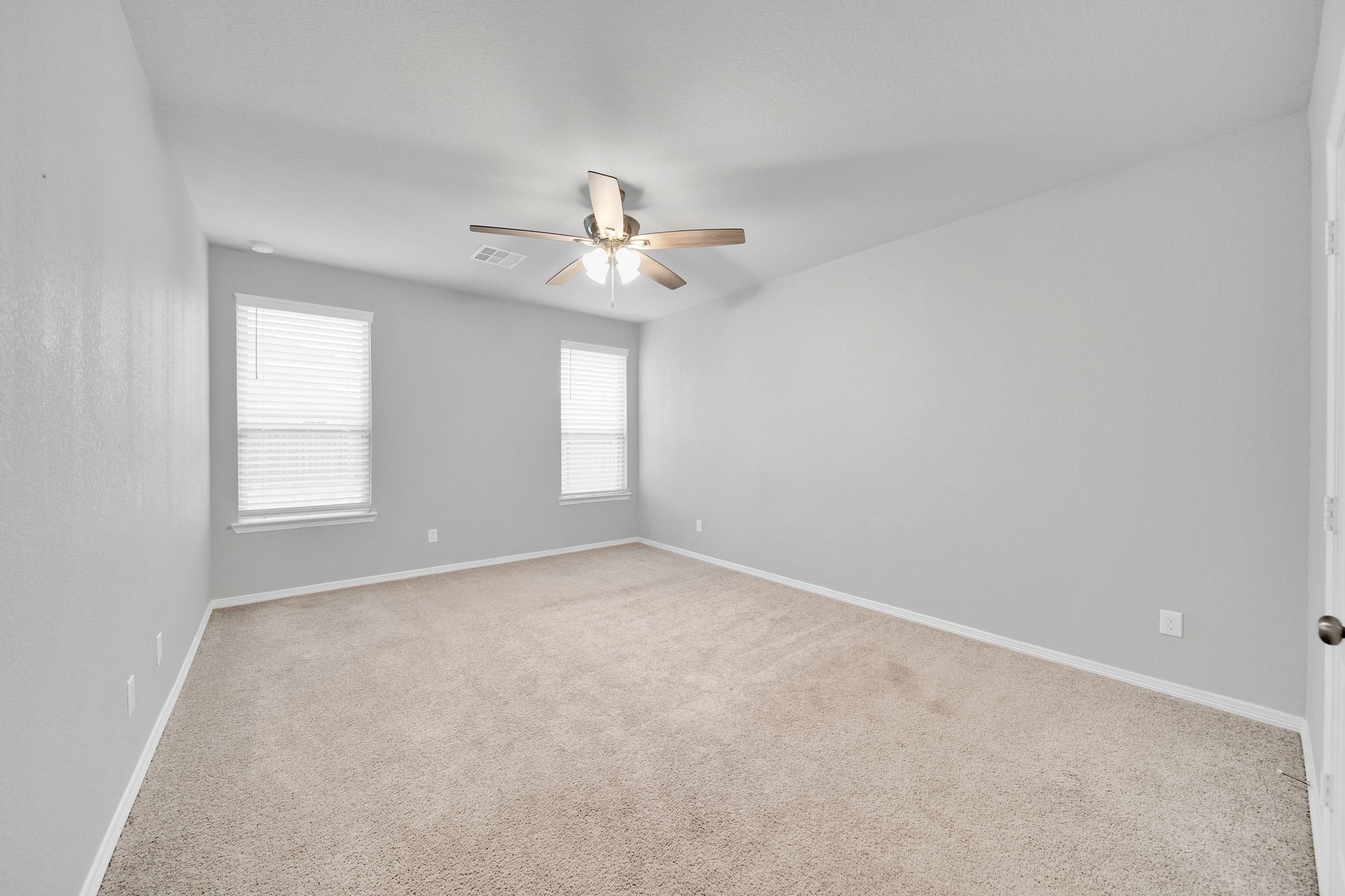 24722 Colony Meadow Trail Houston, TX 77336 - Photo 7 of 16 a view of an empty room with a window