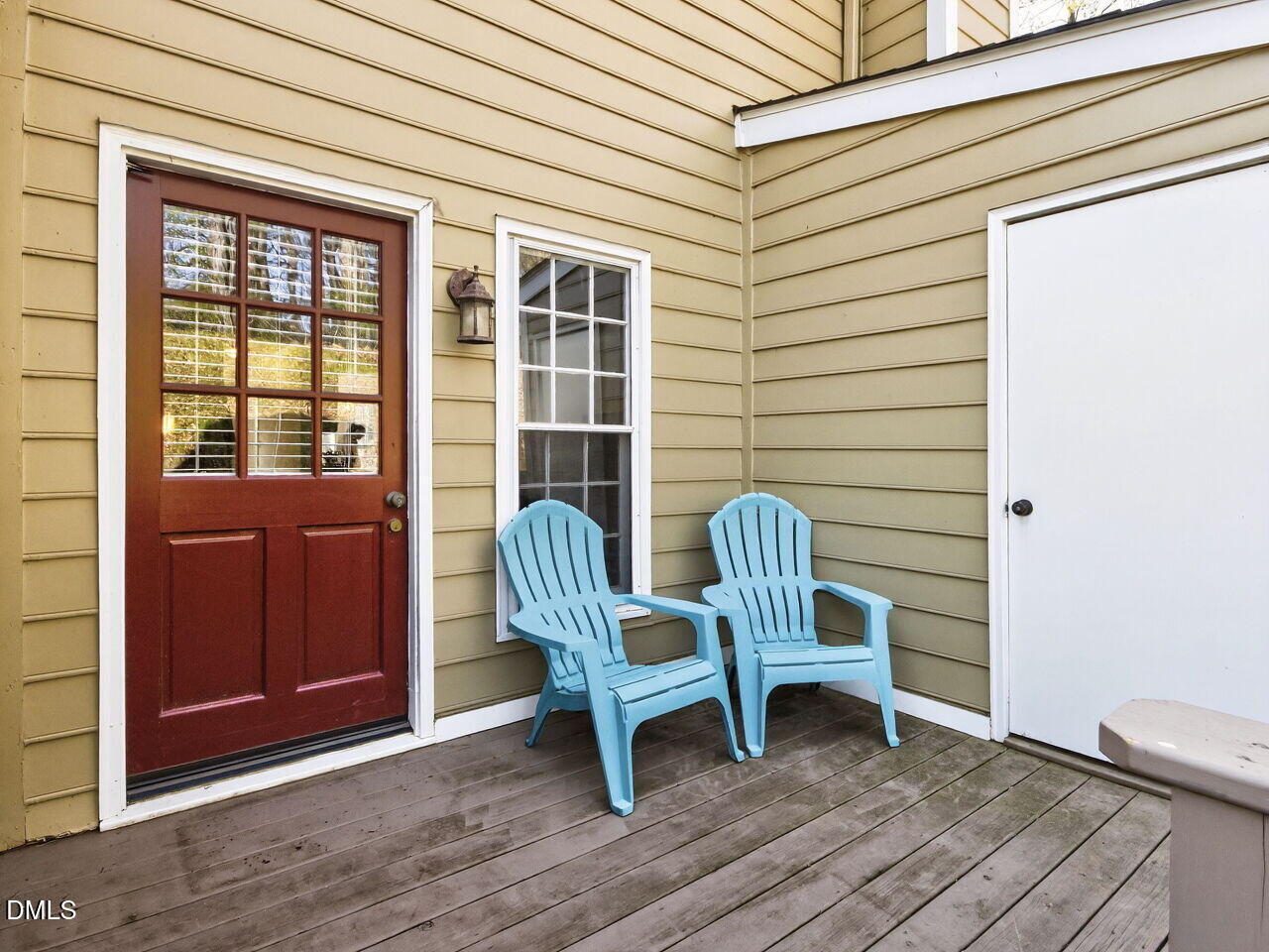 6703 Queen Annes Drive Raleigh, NC 27613 - Photo 16 of 20 a view of a chair and table in the room
