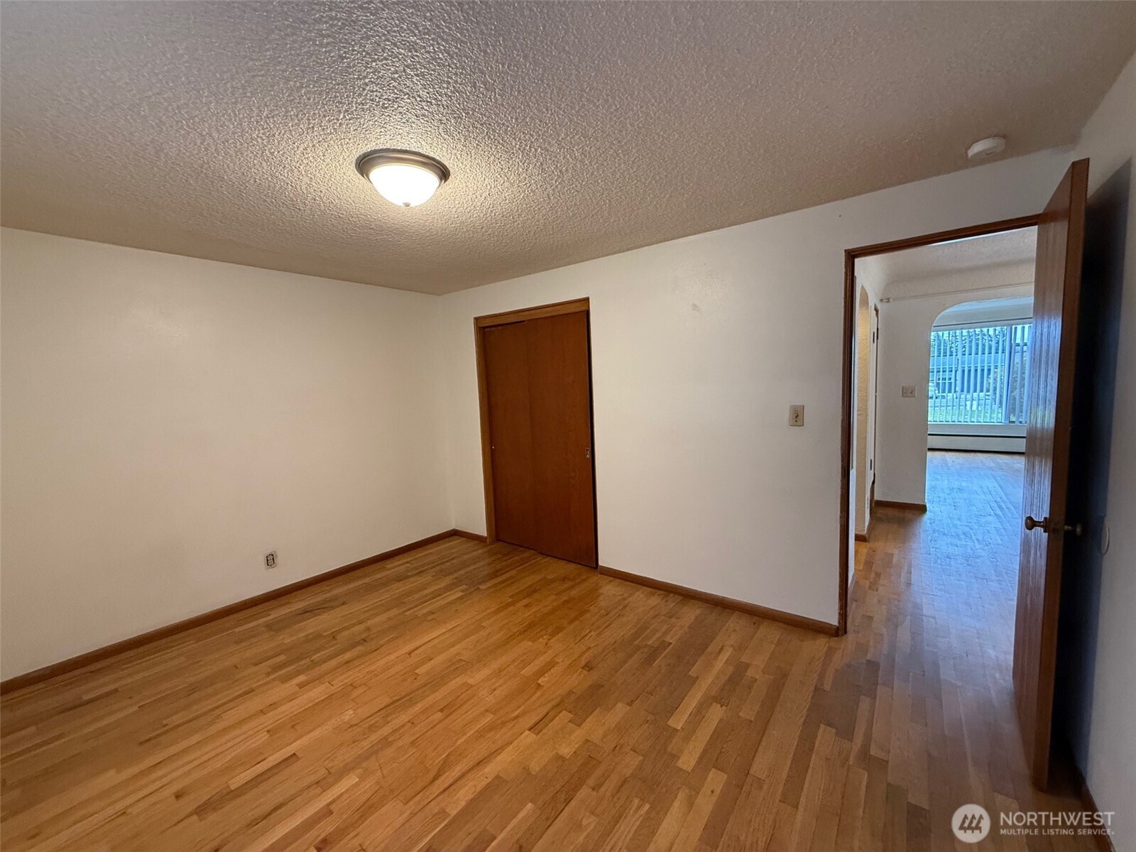 5120 Colby Avenue, Unit 1 Everett, WA 98203 - Photo 9 of 9 wooden floor in an empty room