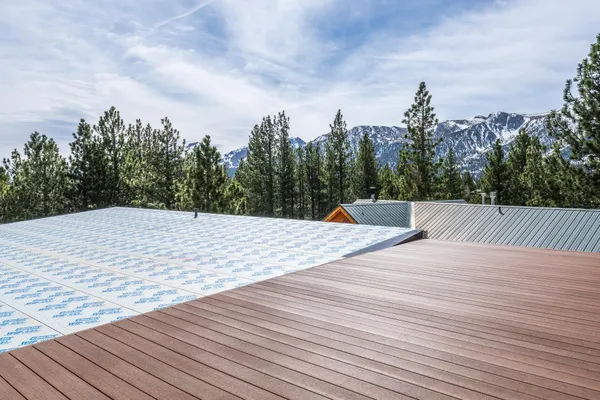 a view of a house with a tree