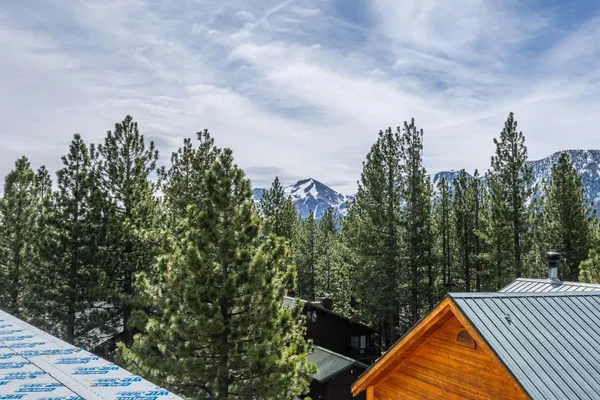 a view of balcony and trees