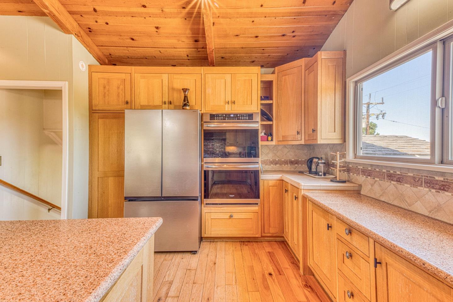 394 Mesa Road Salinas, CA 93908 - Photo 16 of 53 a kitchen with stainless steel appliances granite countertop a refrigerator and a sink
