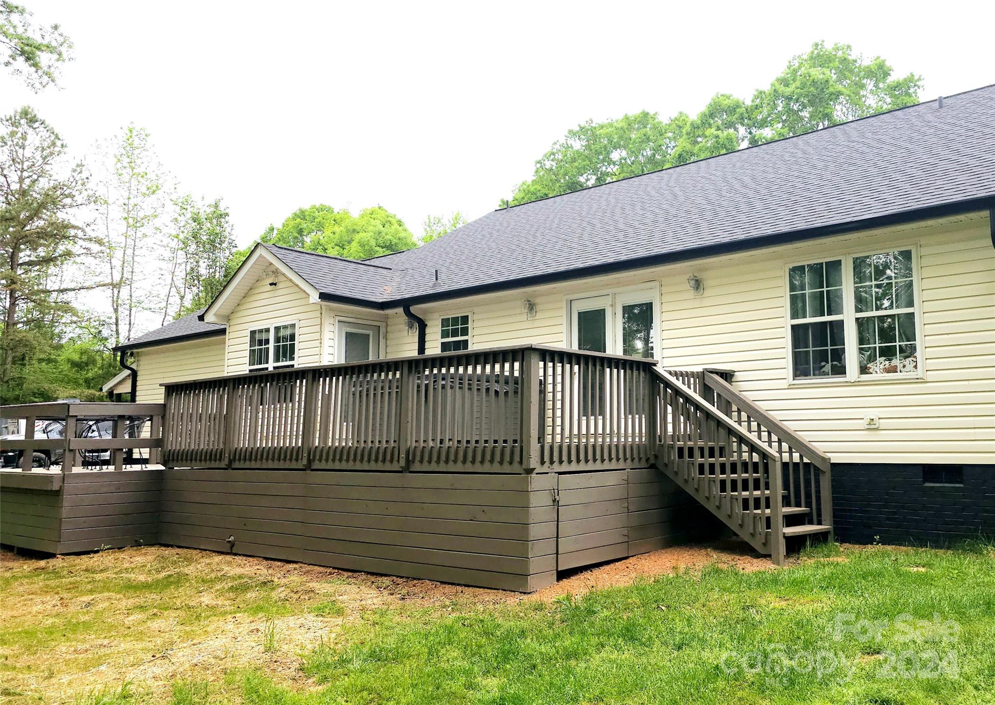 5013 Medlin Road Monroe, NC 28112 - Photo 2 of 30 a view of a house with a yard