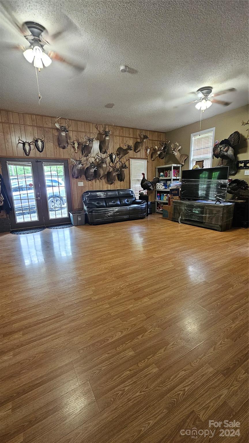 5013 Medlin Road Monroe, NC 28112 - Photo 24 of 30 a view of a room with kitchen island stainless steel appliances sink and living room