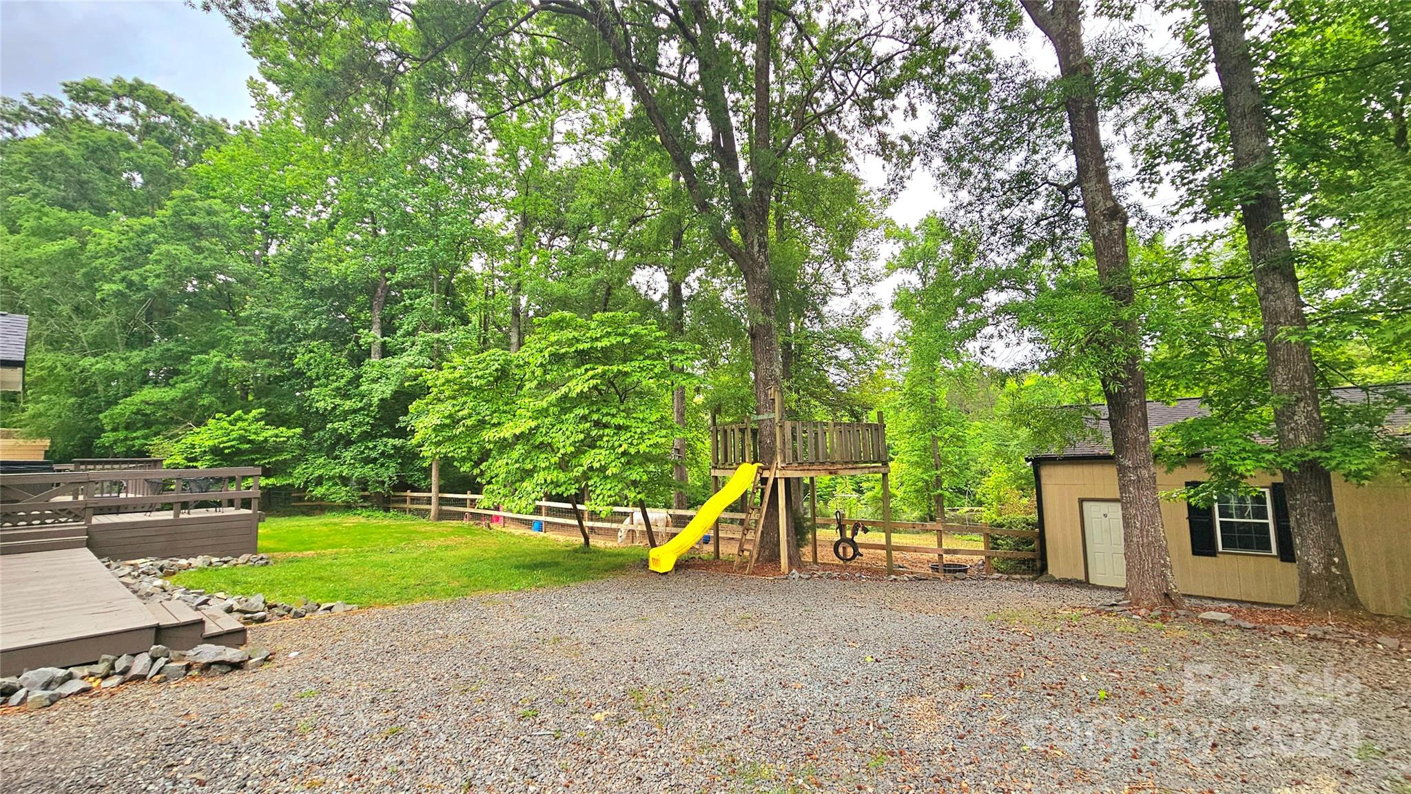 5013 Medlin Road Monroe, NC 28112 - Photo 27 of 30 a view of a house with a yard and large trees