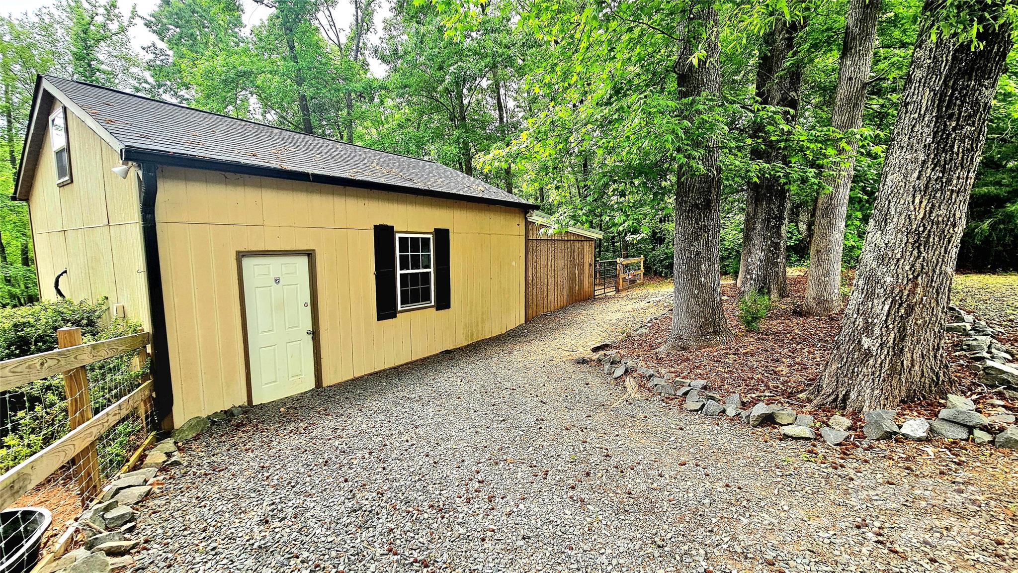 5013 Medlin Road Monroe, NC 28112 - Photo 28 of 30 a front view of a house with garden