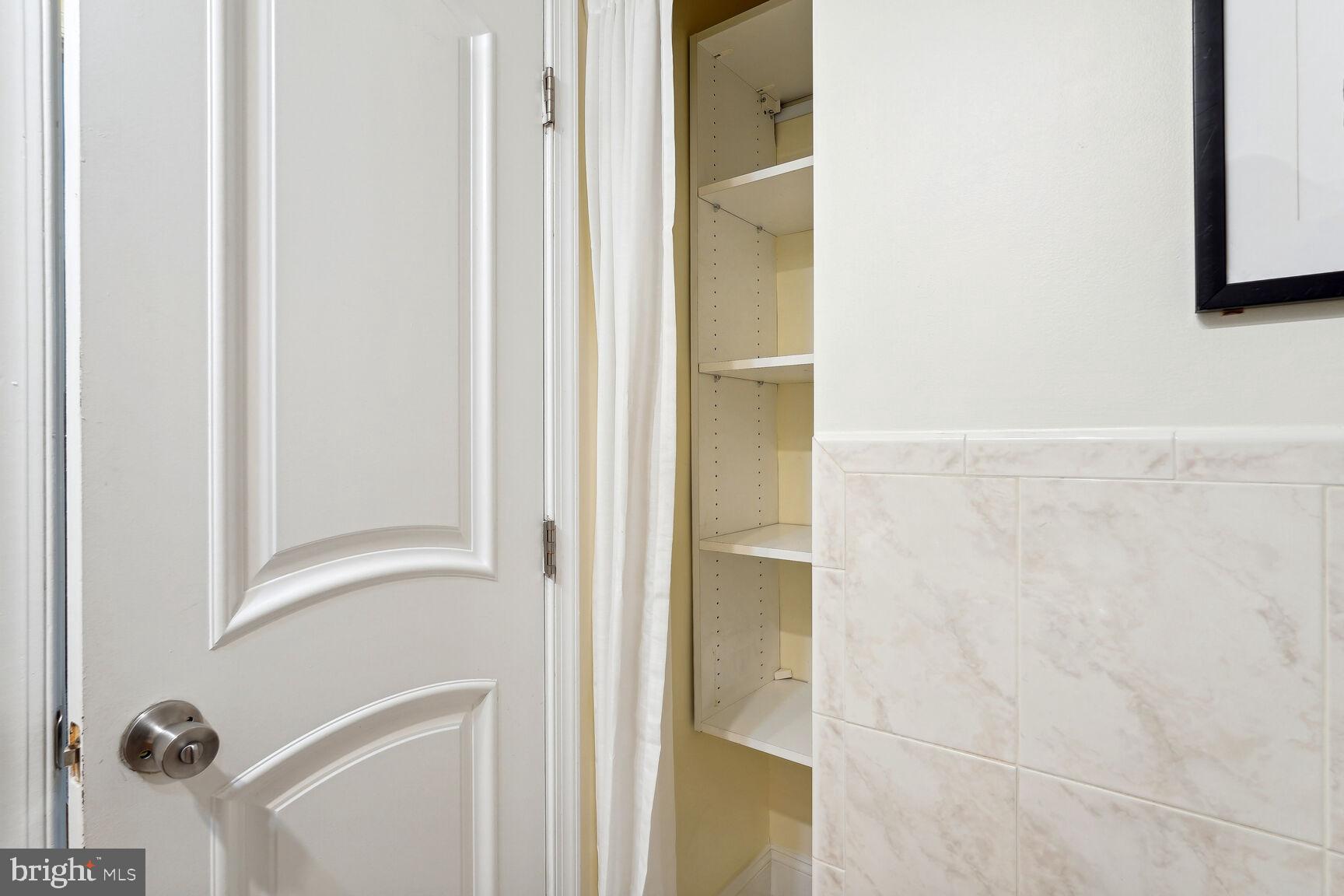 1437 Spring Road Northwest, Unit 11 Washington, DC 20010 - Photo 14 of 15 Bath closet for plenty of storage!