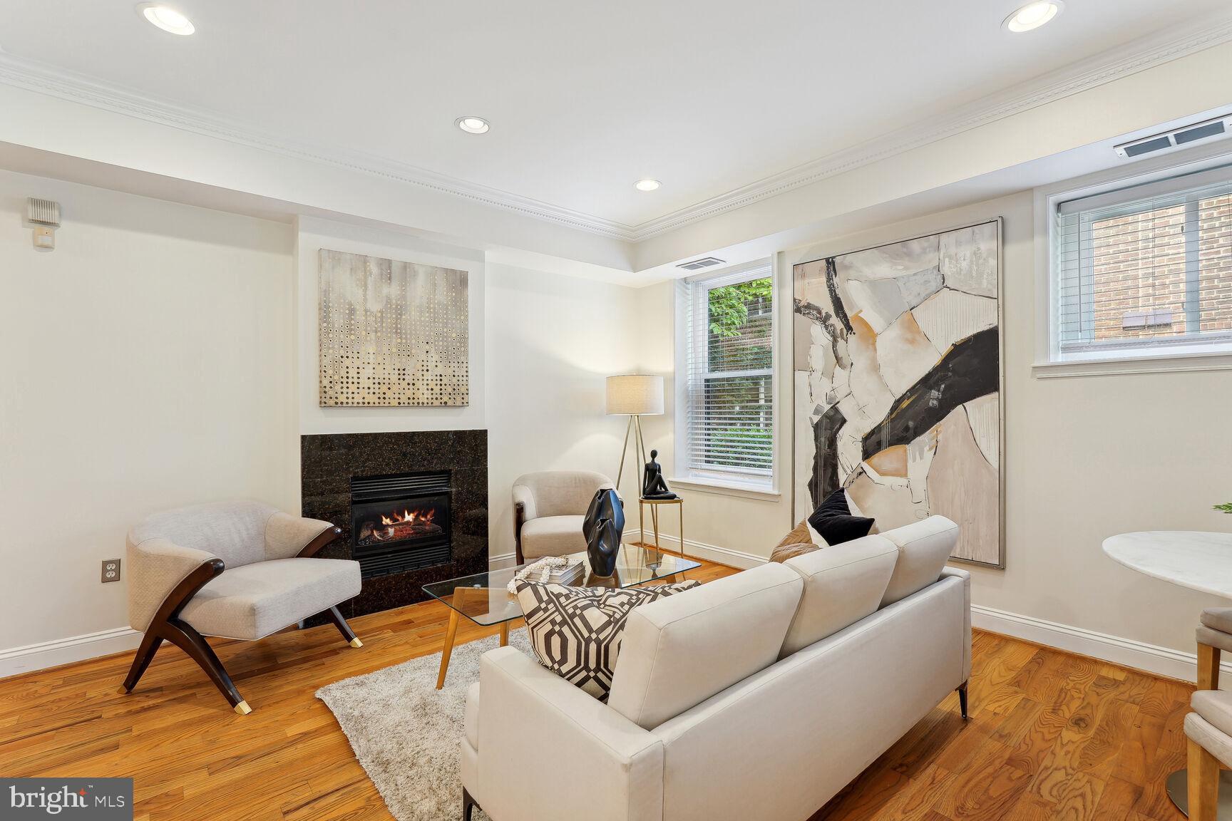 1437 Spring Road Northwest, Unit 11 Washington, DC 20010 - Photo 2 of 15 Enjoy cozy evenings in front of the fire!