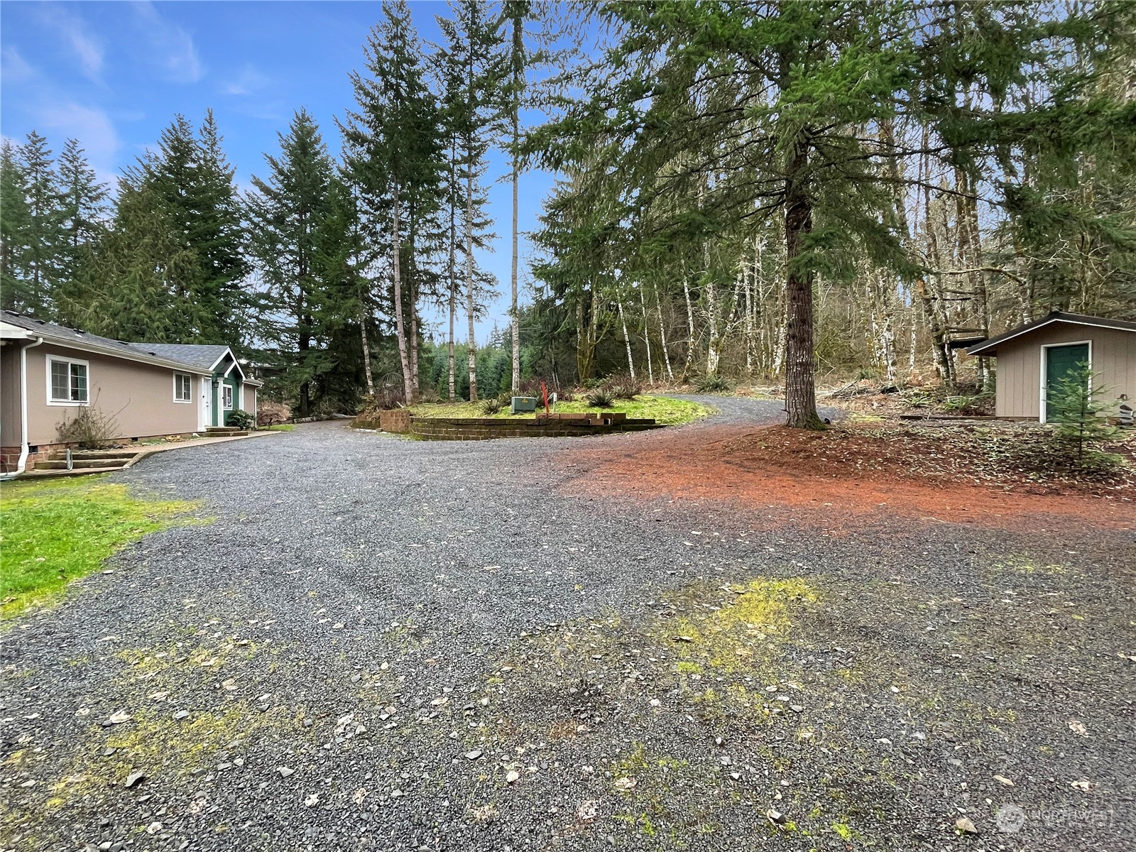 122 Cedar Springs Road Chehalis, WA 98532 - Photo 3 of 40 a view of a house with a yard and large trees