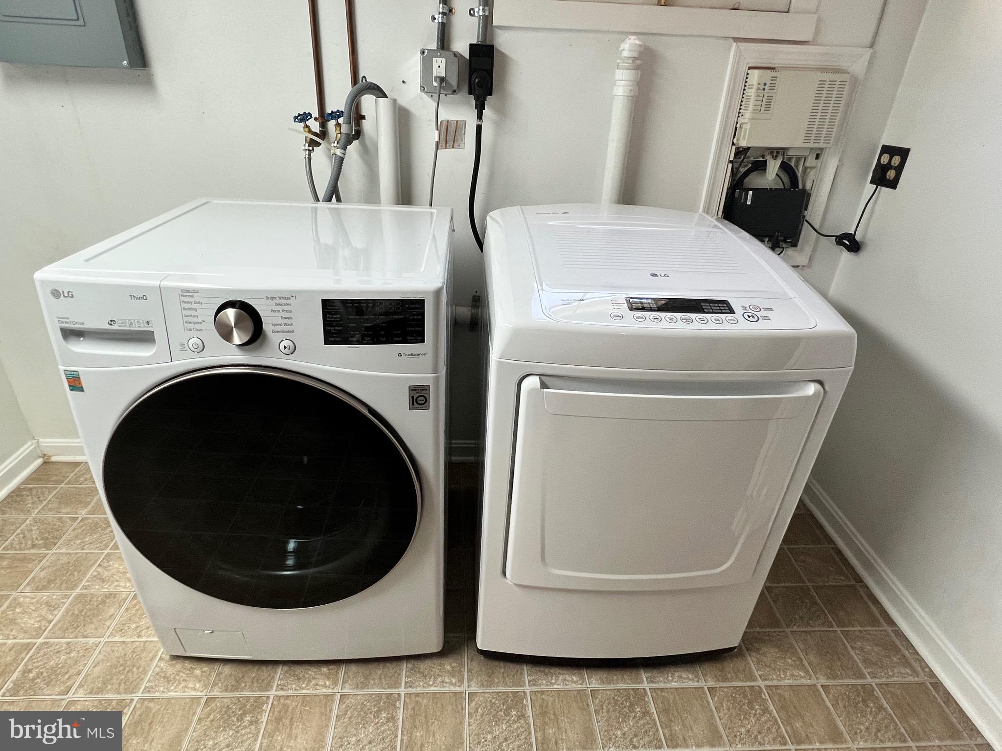 318 Whitestone Road Silver Spring, MD 20901 - Photo 21 of 23 a utility room with dryer and washer