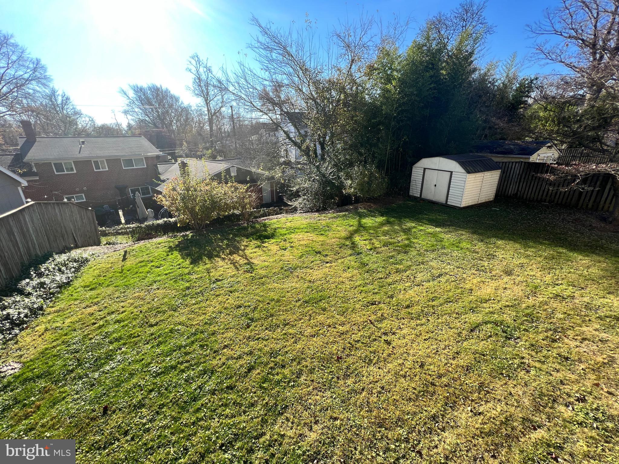 318 Whitestone Road Silver Spring, MD 20901 - Photo 9 of 23 a backyard of a house with lots of green space