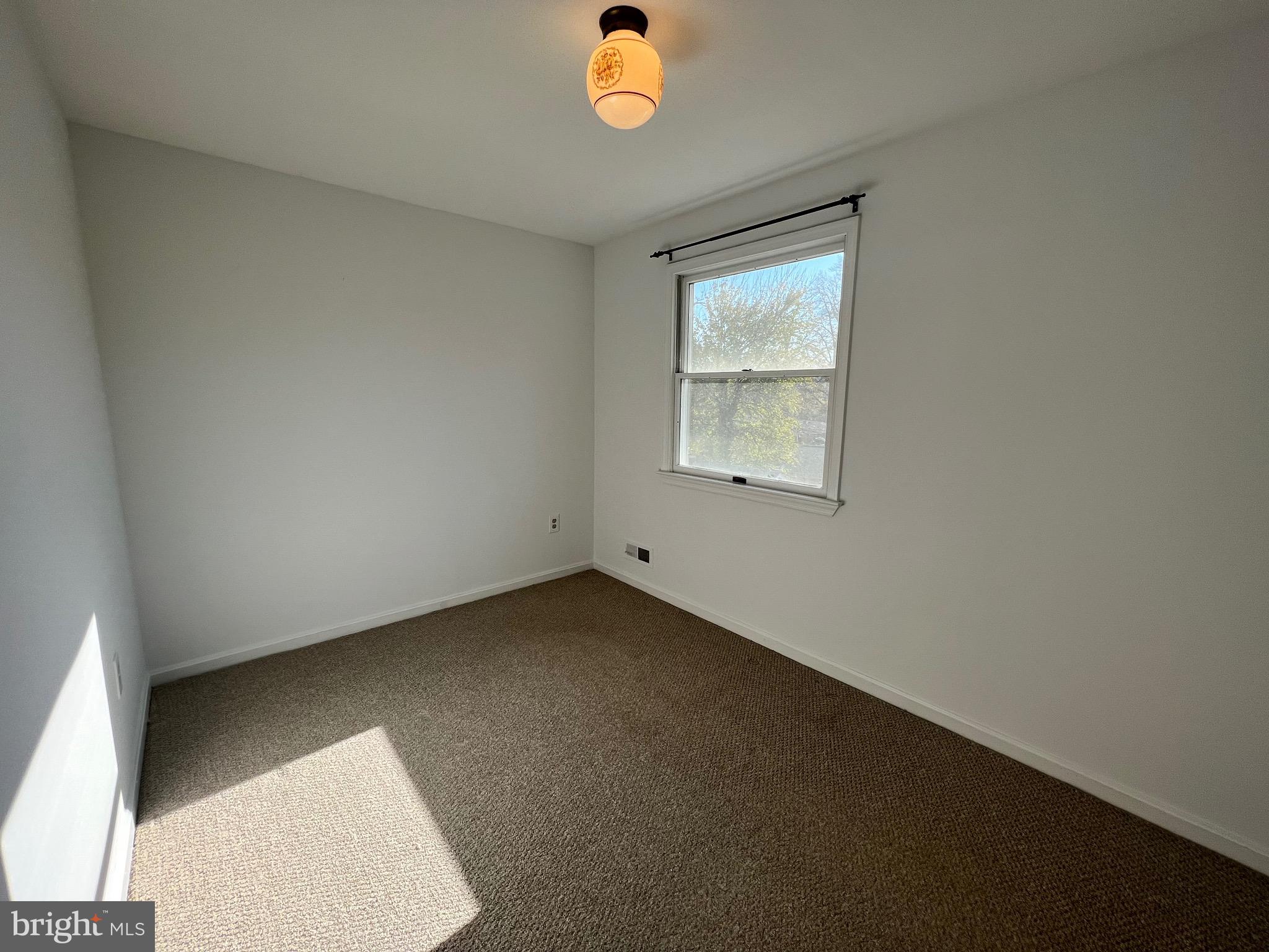 318 Whitestone Road Silver Spring, MD 20901 - Photo 10 of 23 an empty room with window