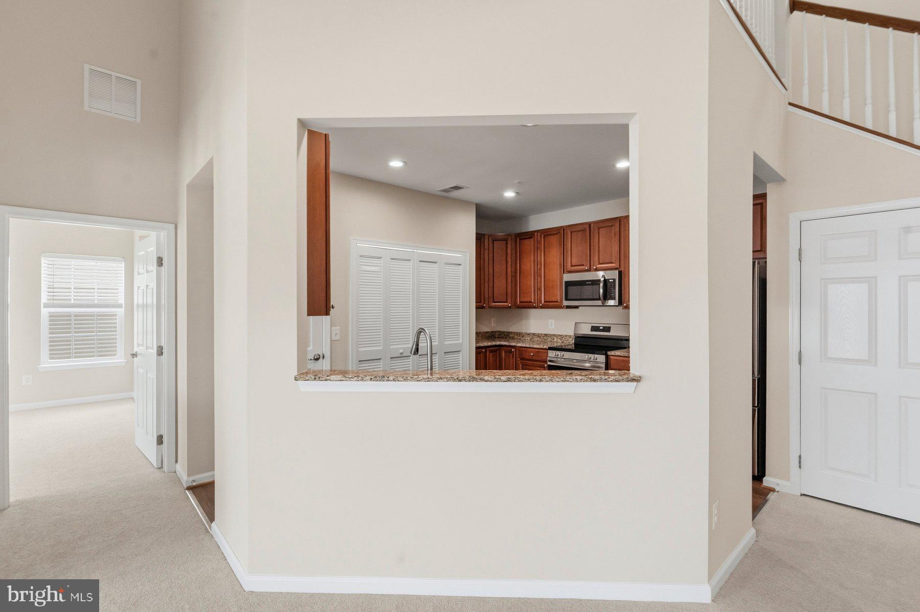 637 Wallingford Road, Unit 401 Bel Air, MD 21014 - Photo 9 of 28 Cut out to kitchen.