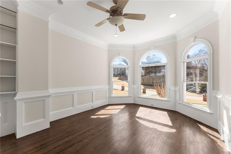 10 Club Court Alpharetta, GA 30005 - Photo 28 of 107 a view of an empty room with a window and wooden floor
