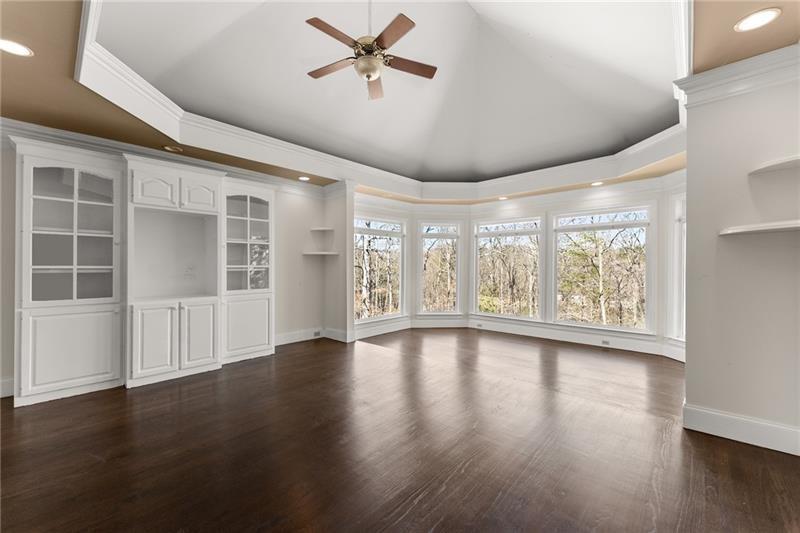 10 Club Court Alpharetta, GA 30005 - Photo 50 of 107 a view of an empty room with wooden floor and a window