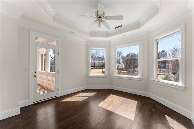 10 Club Court Alpharetta, GA 30005 - Photo 55 of 107 a view of empty room with wooden floor and fan