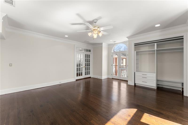 10 Club Court Alpharetta, GA 30005 - Photo 59 of 107 a view of an empty room with a window and wooden floor