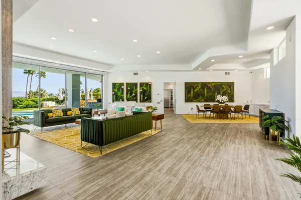 a kitchen with stainless steel appliances granite countertop a stove and a microwave