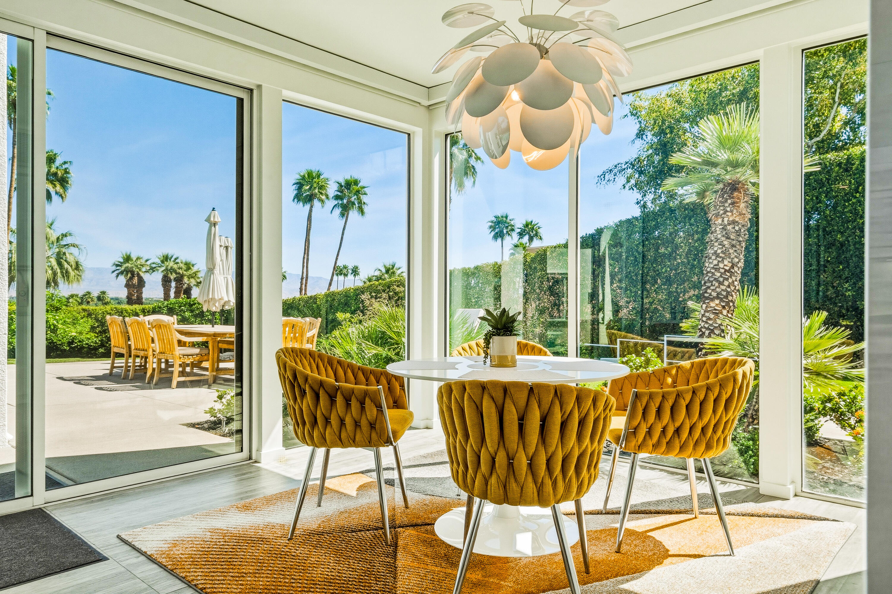 70288 Pecos Road Rancho Mirage, CA 92270 - Photo 23 of 69 a view of a dining room with furniture water view and balcony