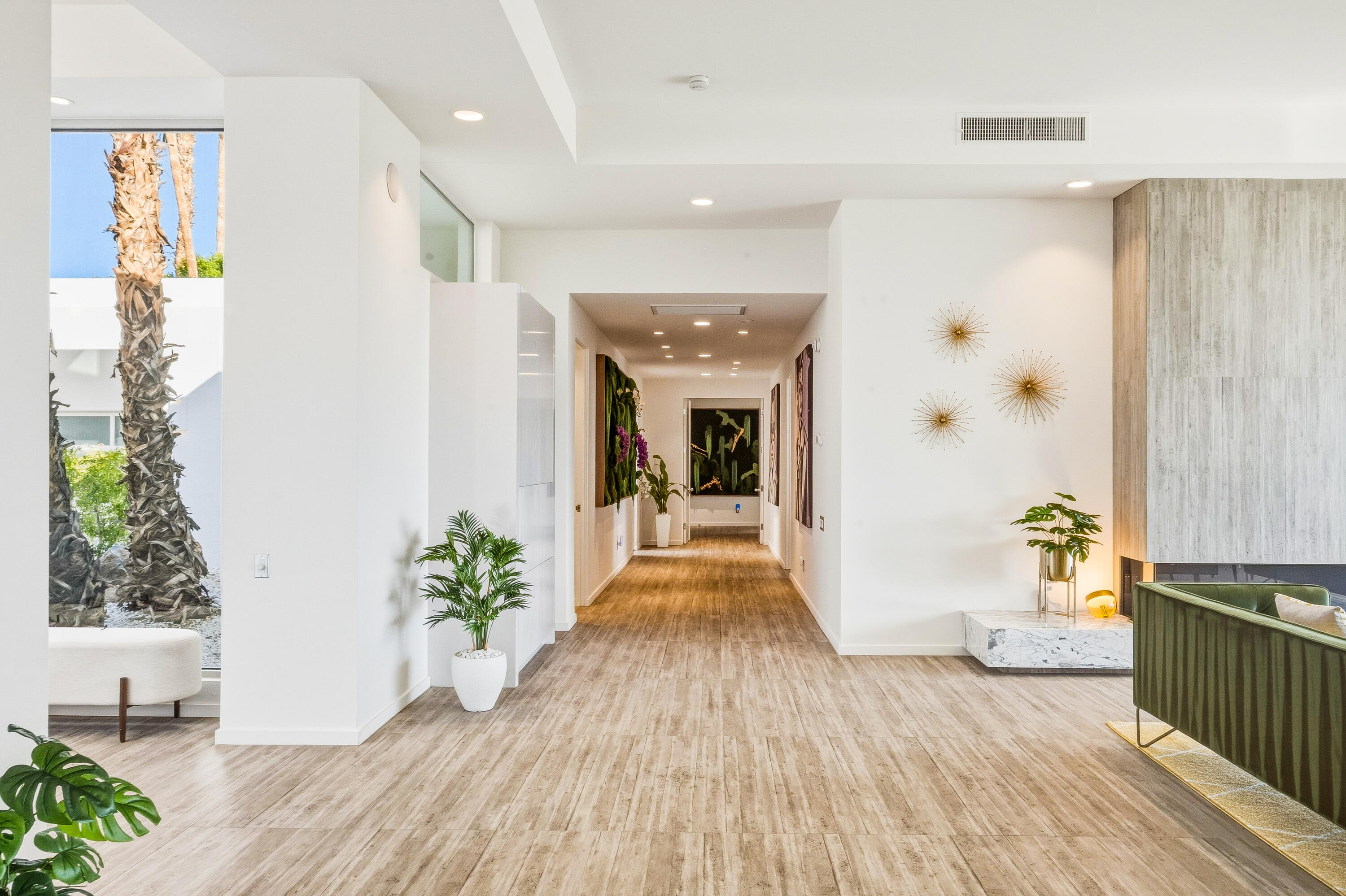 70288 Pecos Road Rancho Mirage, CA 92270 - Photo 31 of 69 a view of a hallway view with wooden floor and furniture