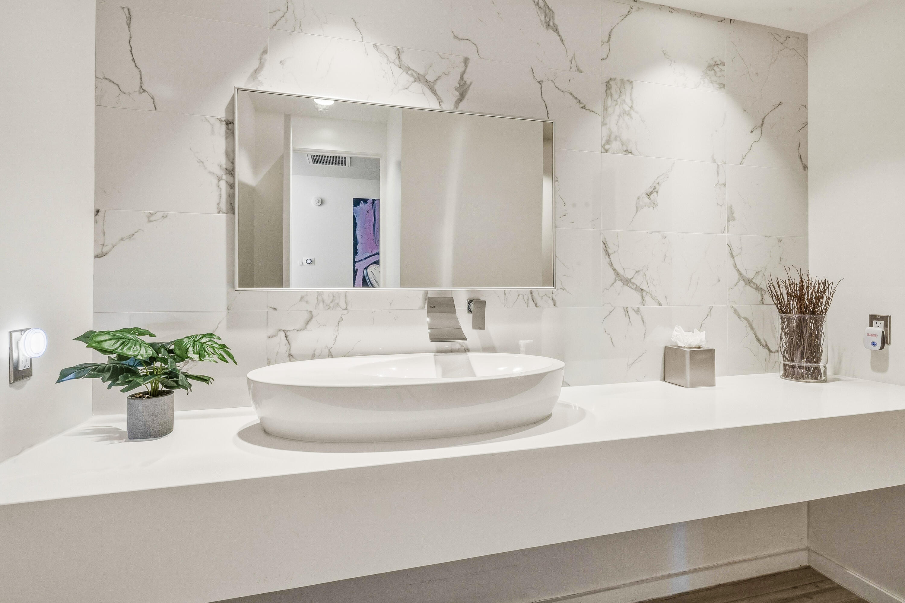 70288 Pecos Road Rancho Mirage, CA 92270 - Photo 32 of 69 a bathroom with a sink and a mirror