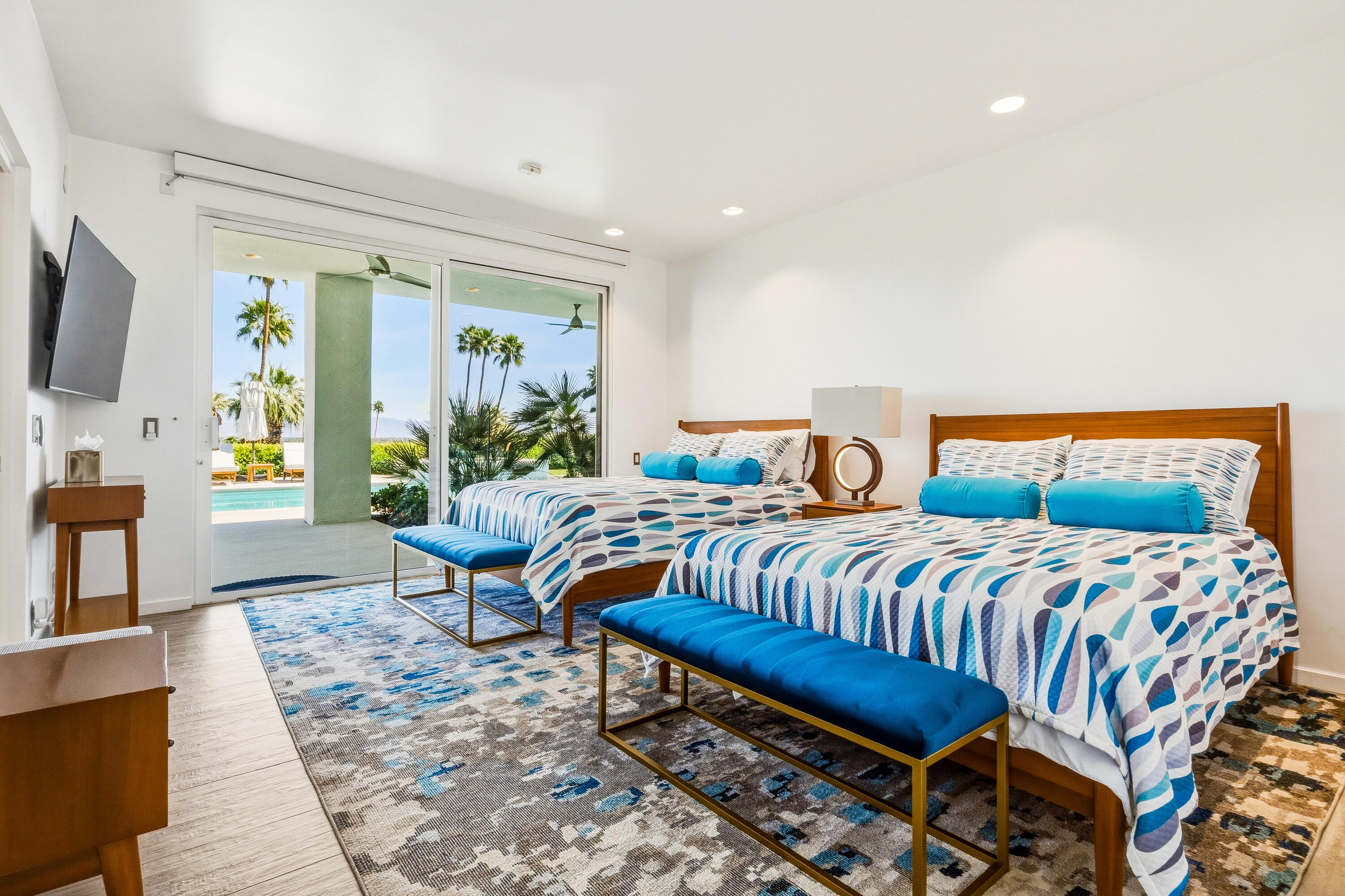 70288 Pecos Road Rancho Mirage, CA 92270 - Photo 33 of 69 a bedroom with a bed and wooden floor