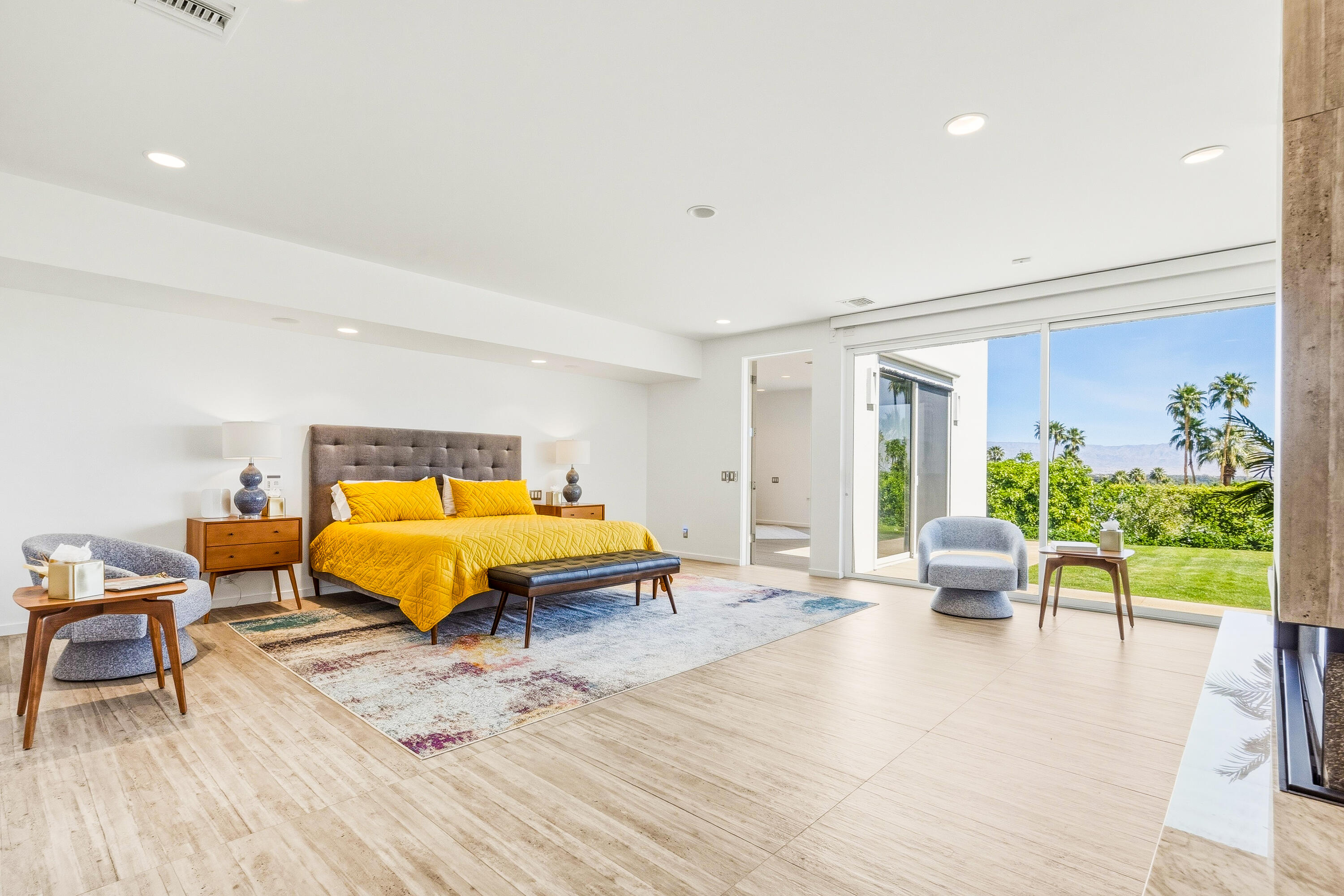 70288 Pecos Road Rancho Mirage, CA 92270 - Photo 37 of 69 a bedroom with a bed and wooden floor