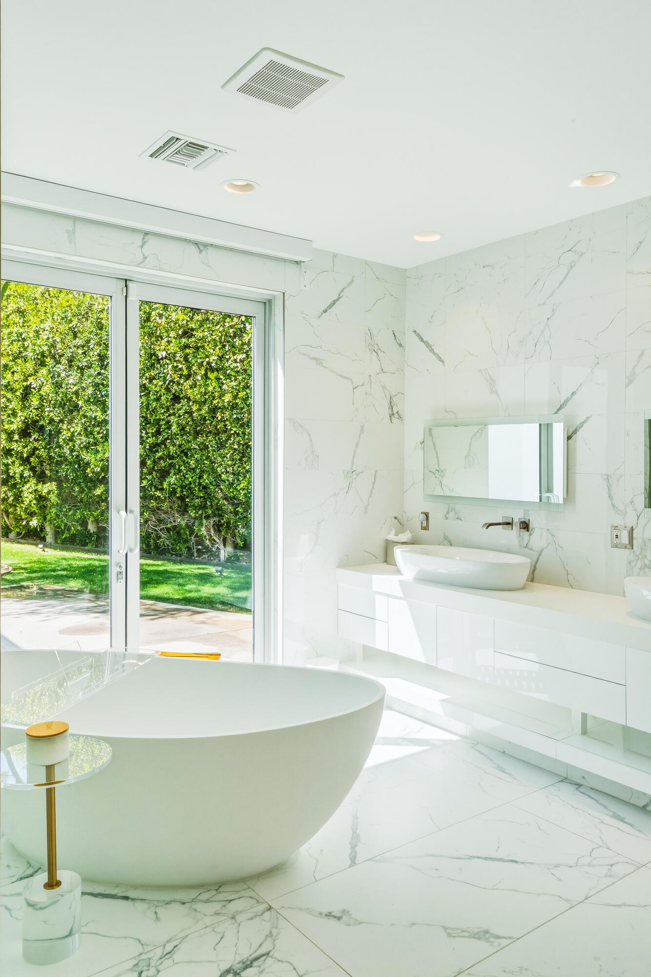 70288 Pecos Road Rancho Mirage, CA 92270 - Photo 44 of 69 a bathroom with a bathtub and next to a window