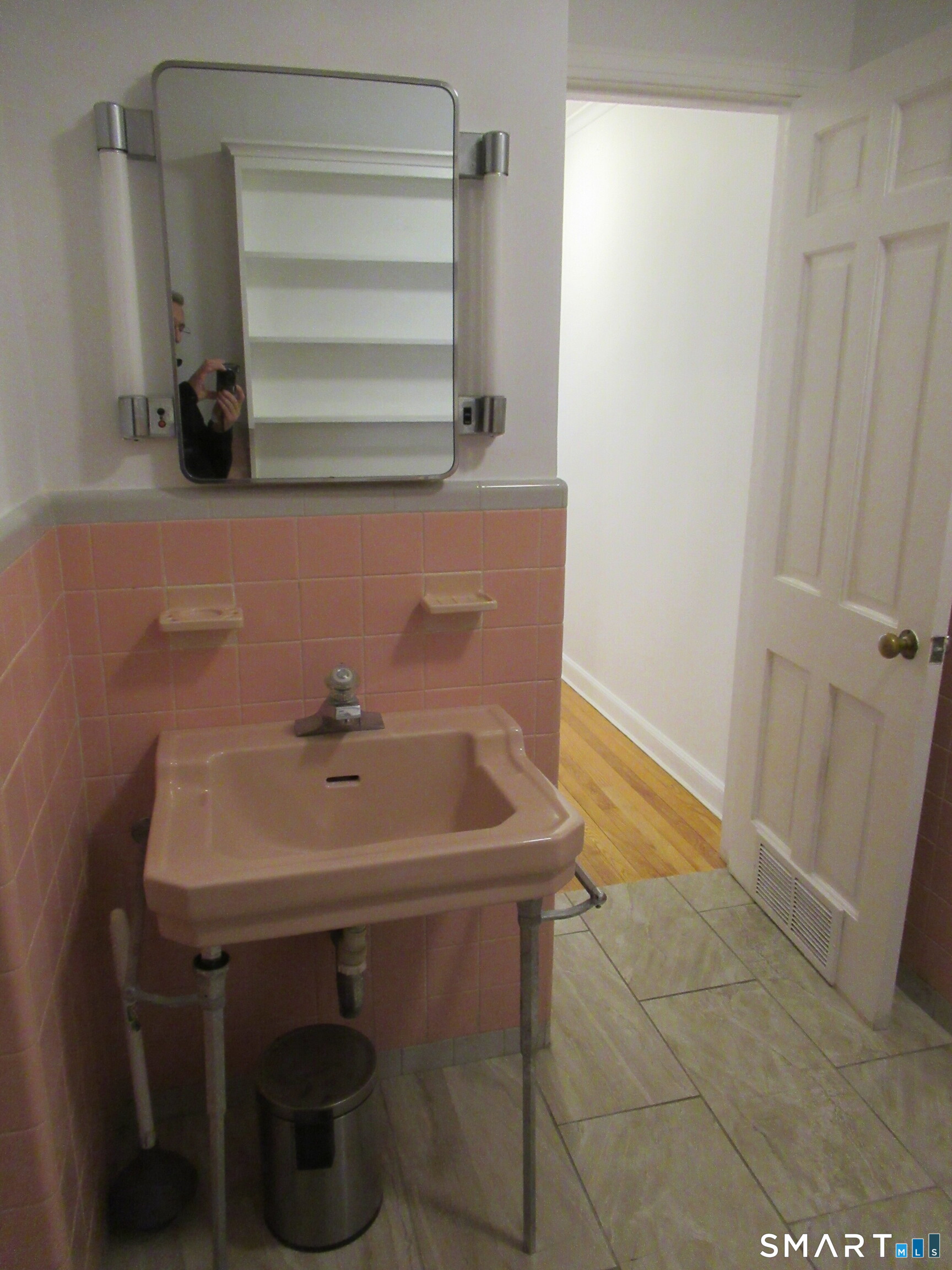 11 Burnt Swamp Road Woodbridge, CT 06525 - Photo 21 of 29 a bathroom with a sink and a mirror