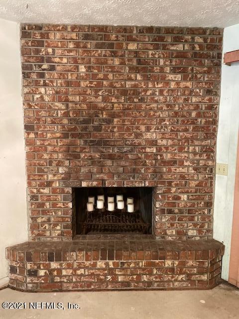 335 Wesley Road Green Cove Springs, FL 32043 - Photo 12 of 39 Brick Fireplace