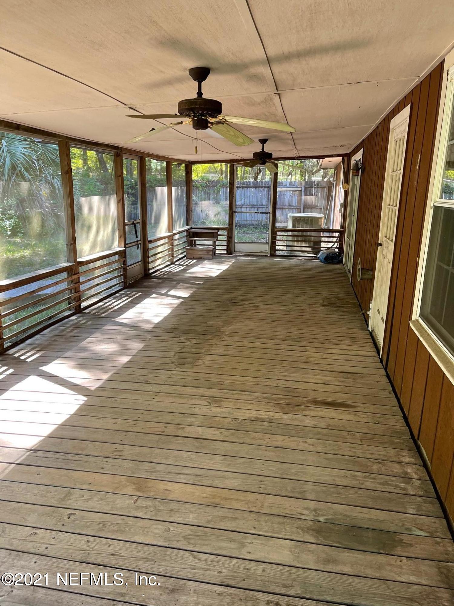 335 Wesley Road Green Cove Springs, FL 32043 - Photo 20 of 39 Screened patio
