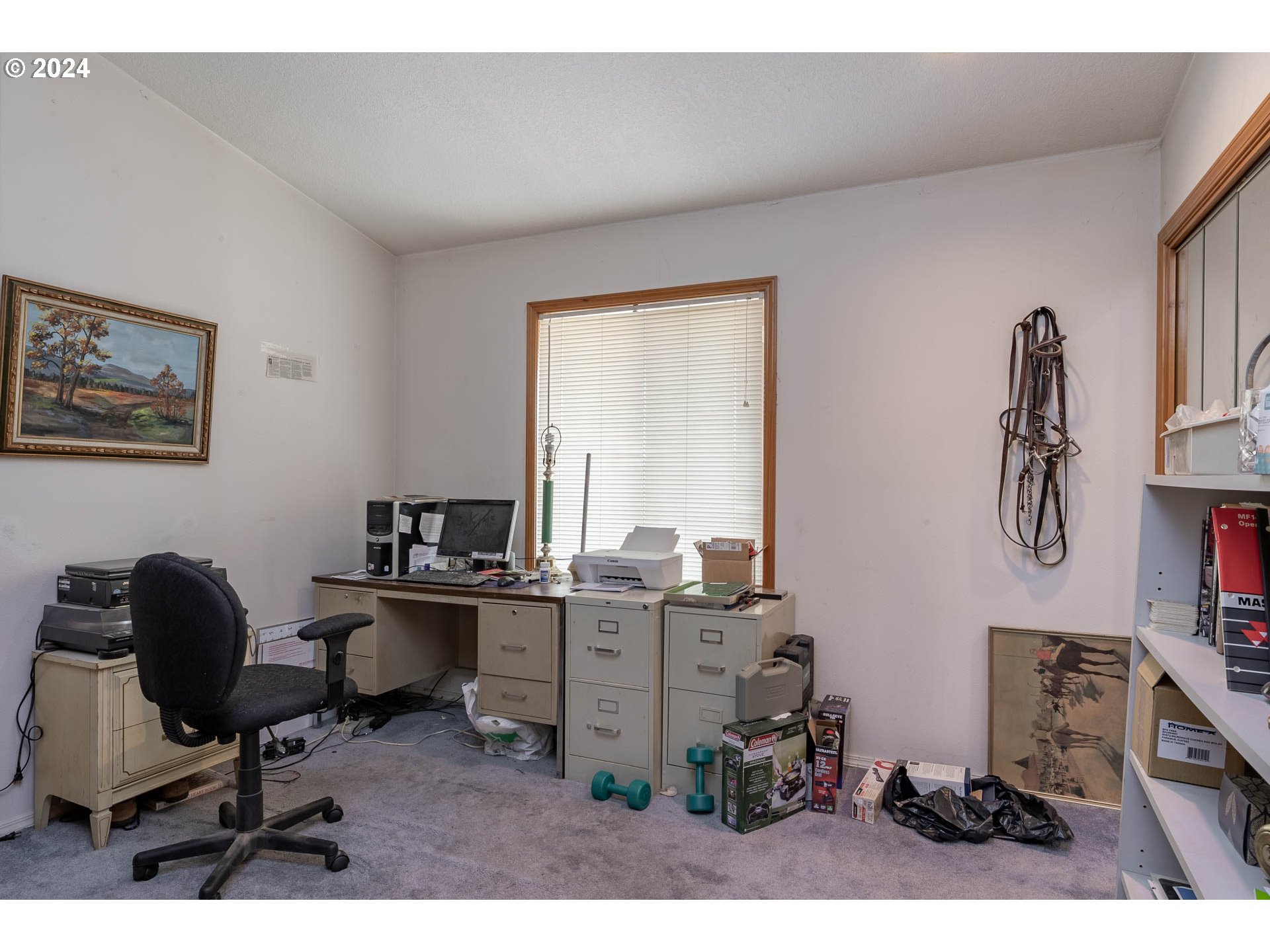 16500 Falls City Road Dallas, OR 97338 - Photo 18 of 36 a view of a workspace with furniture and a window
