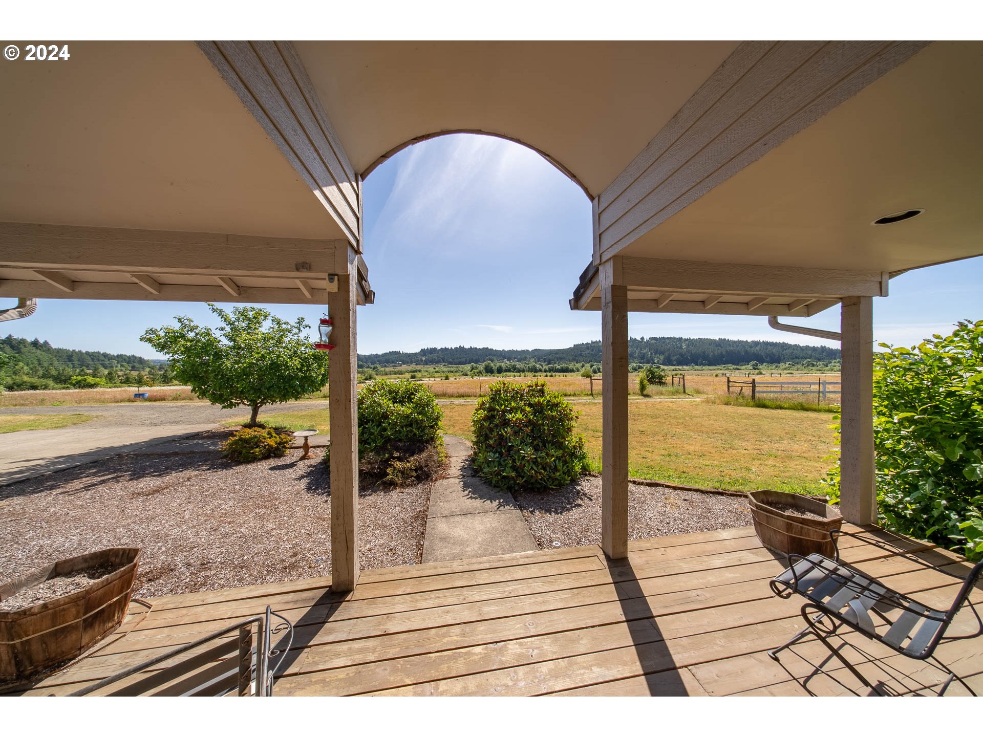 16500 Falls City Road Dallas, OR 97338 - Photo 21 of 36 a view of a balcony with wooden floor