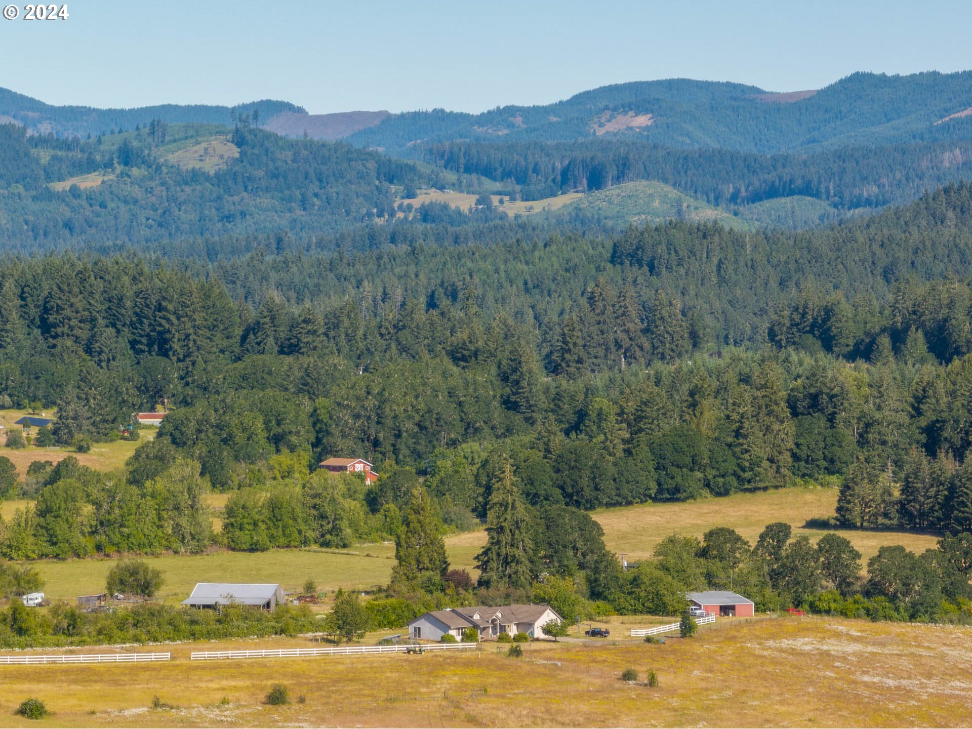 16500 Falls City Road Dallas, OR 97338 - Photo 32 of 36 a view of a town with mountains in the background