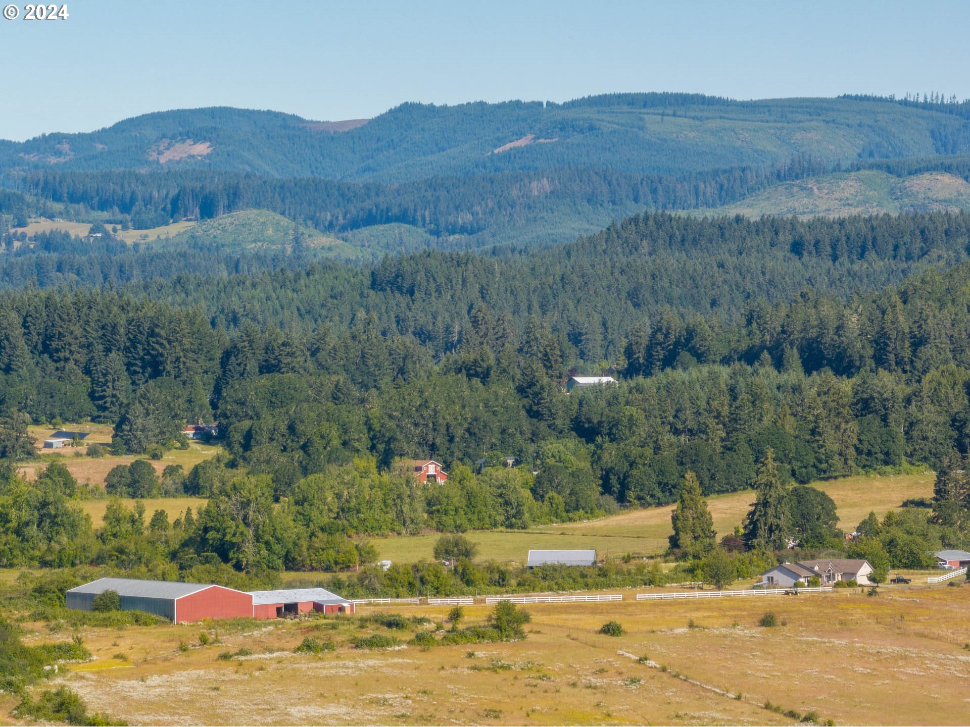 16500 Falls City Road Dallas, OR 97338 - Photo 33 of 36 a view of a mountain with green field