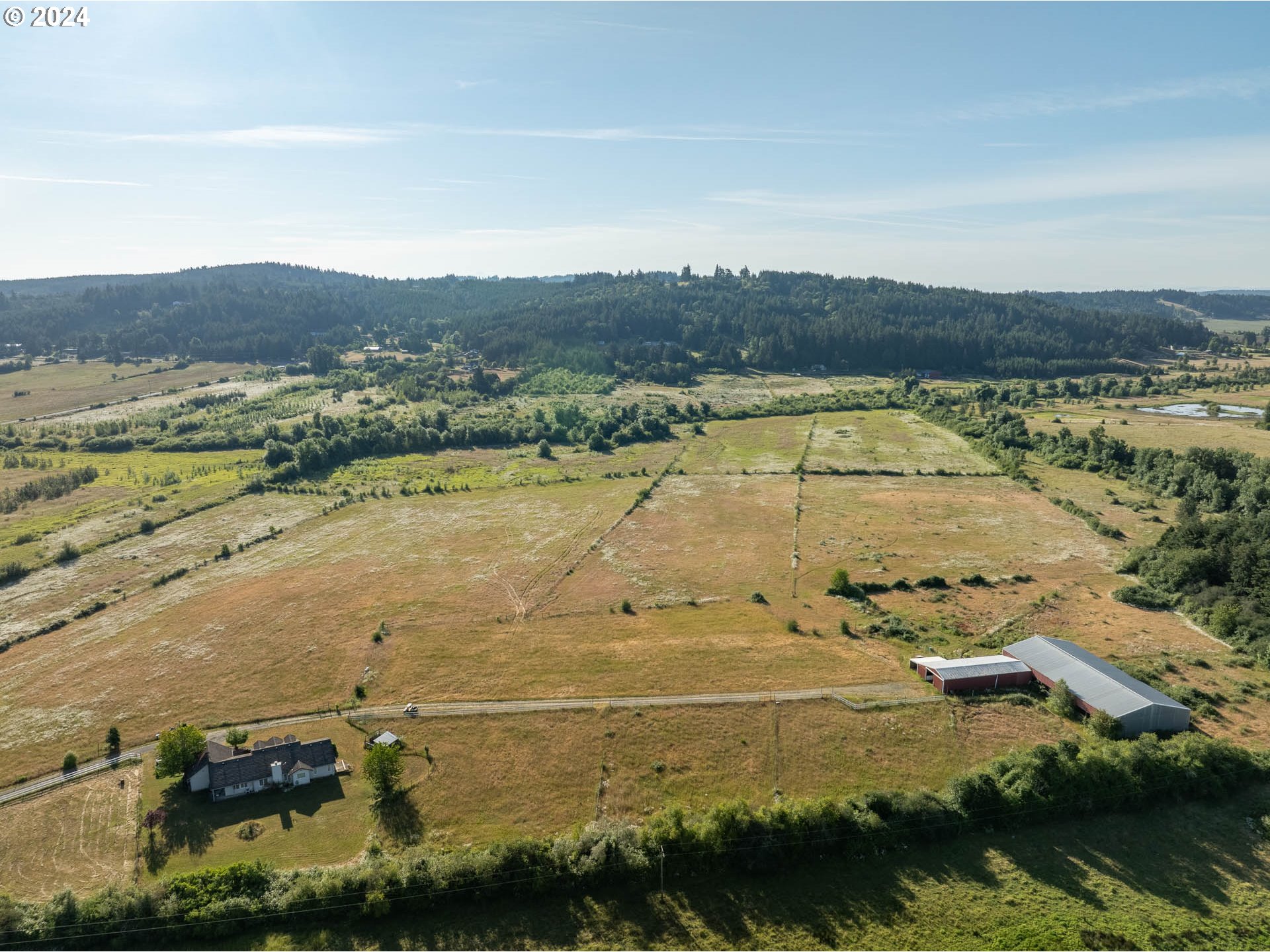 16500 Falls City Road Dallas, OR 97338 - Photo 4 of 36 an aerial view of residential houses with outdoor space