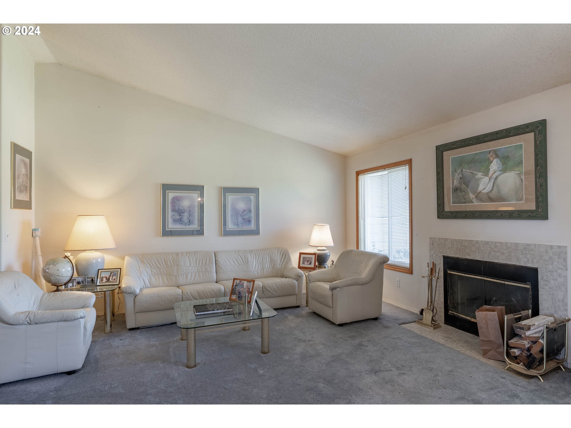 16500 Falls City Road Dallas, OR 97338 - Photo 8 of 36 a living room with furniture and a fireplace