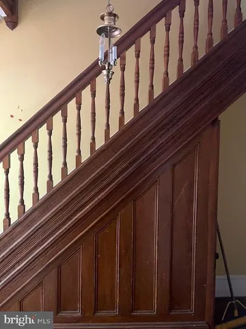 a view of fireplace with wooden floor