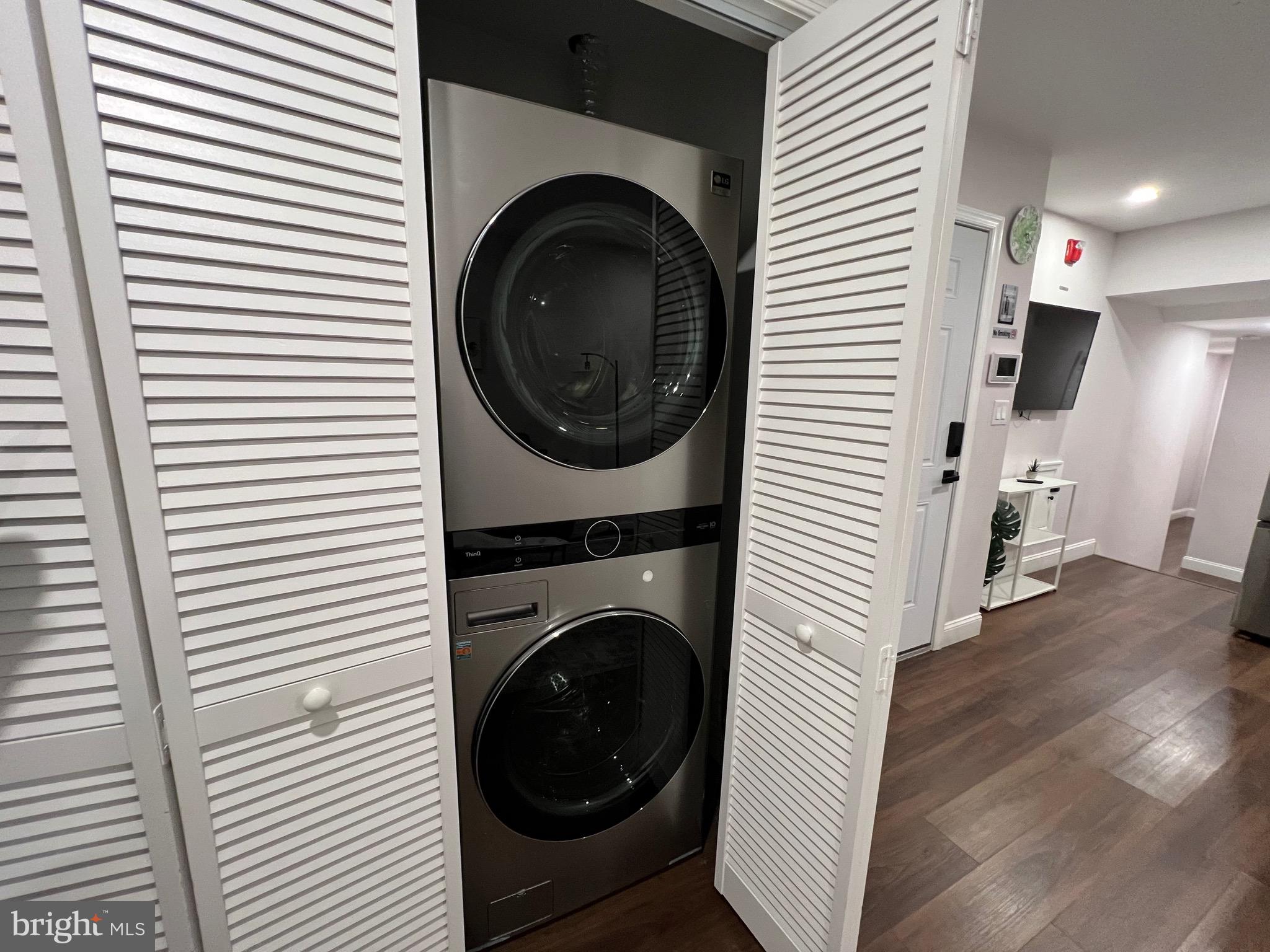 1985 North 63rd Street, Unit 3 Philadelphia, PA 19151 - Photo 6 of 23 a view of a hallway with washer and dryer