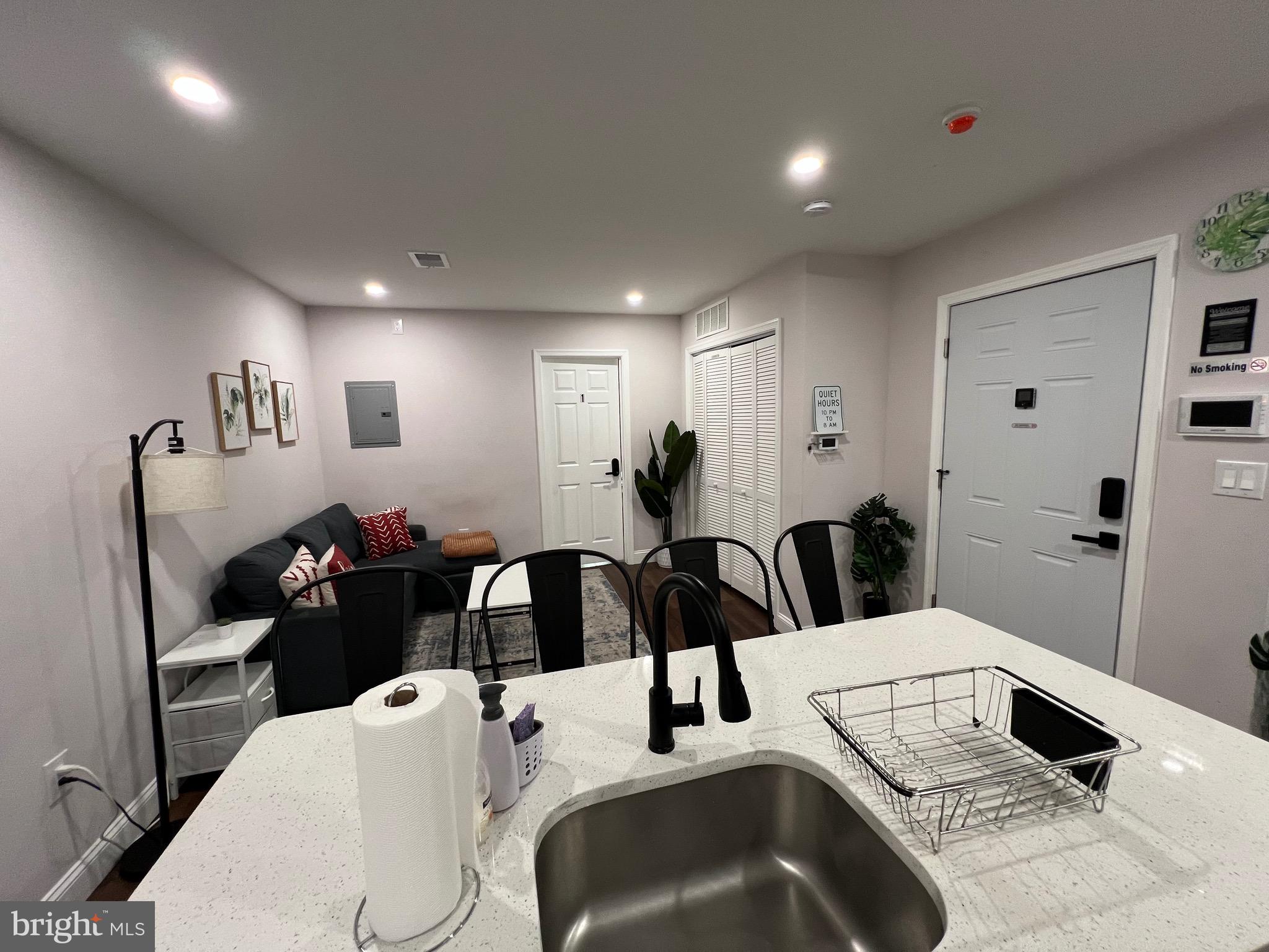 1985 North 63rd Street, Unit 3 Philadelphia, PA 19151 - Photo 8 of 23 a living room with furniture and a wooden floor